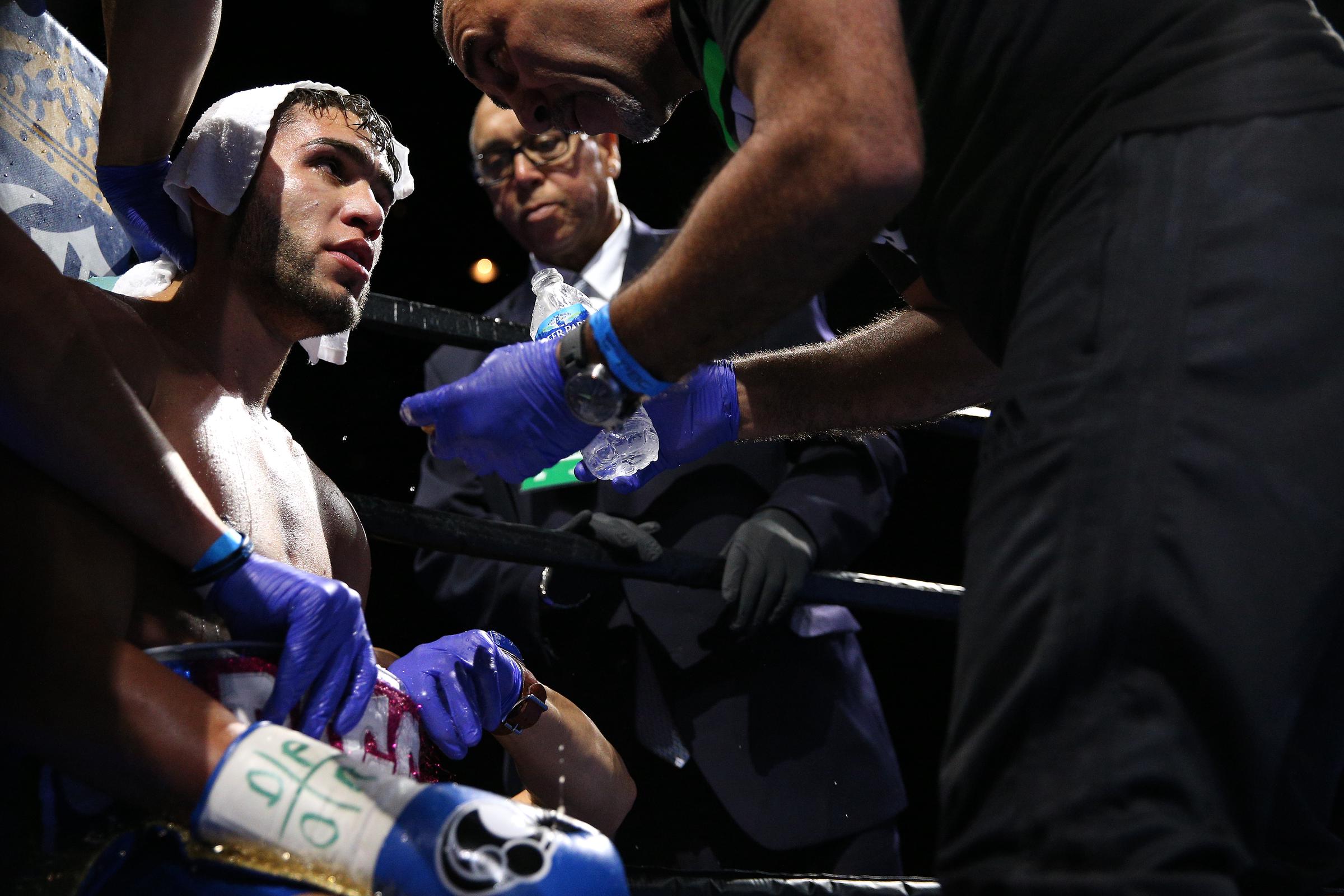 Prichard sits in his corner during the fight against Terrel. Three days later, Terrel told the Los Angeles Times that he was praying for Colón to make a full recovery. | Source: Getty Images