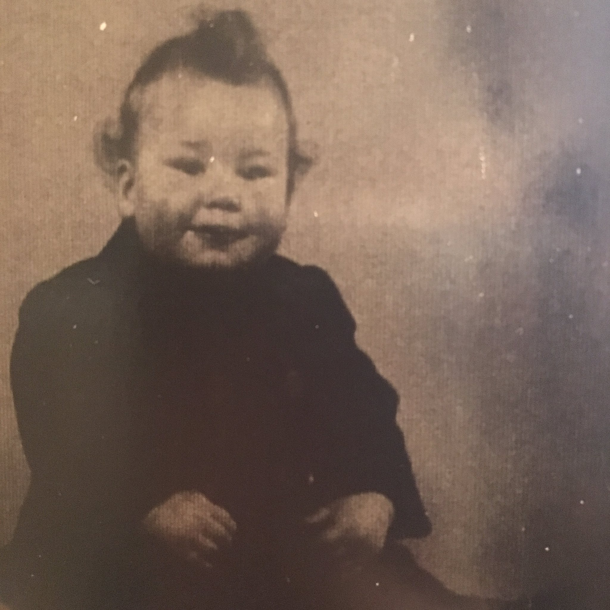 A rare childhood portrait captures a cheerful moment from Patrick Stewart’s early years. He later recalled growing up in a modest Yorkshire home, where he shared a bed with his older brother Trevor and the family lived without an indoor toilet or running hot water. | Source: CelebStory