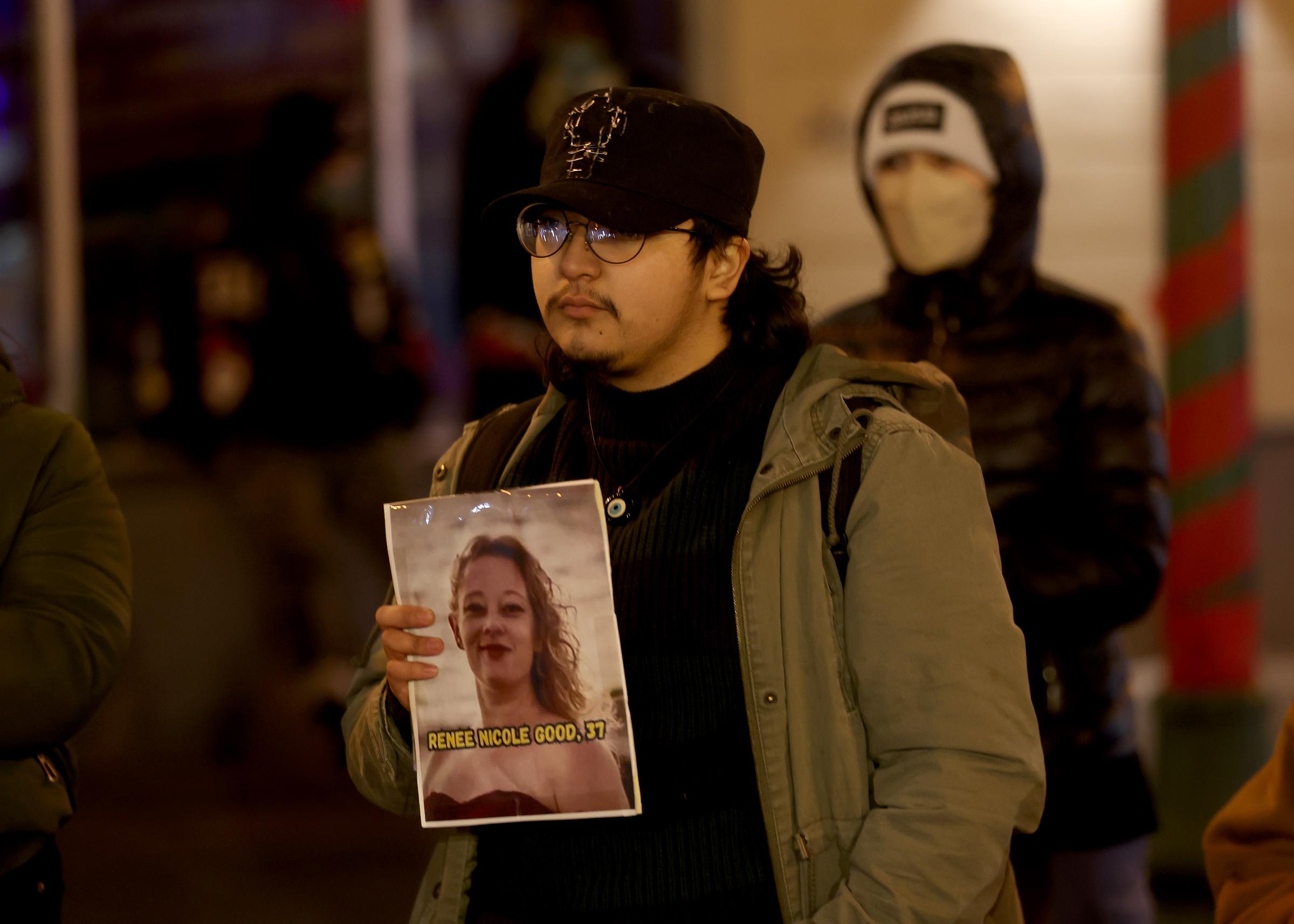 Pablo Rivera and other protesters take part in a vigil for Renee Nicole Good at Fruitvale Plaza Park on January 7, 2025, in Oakland, California | Source: Getty Images