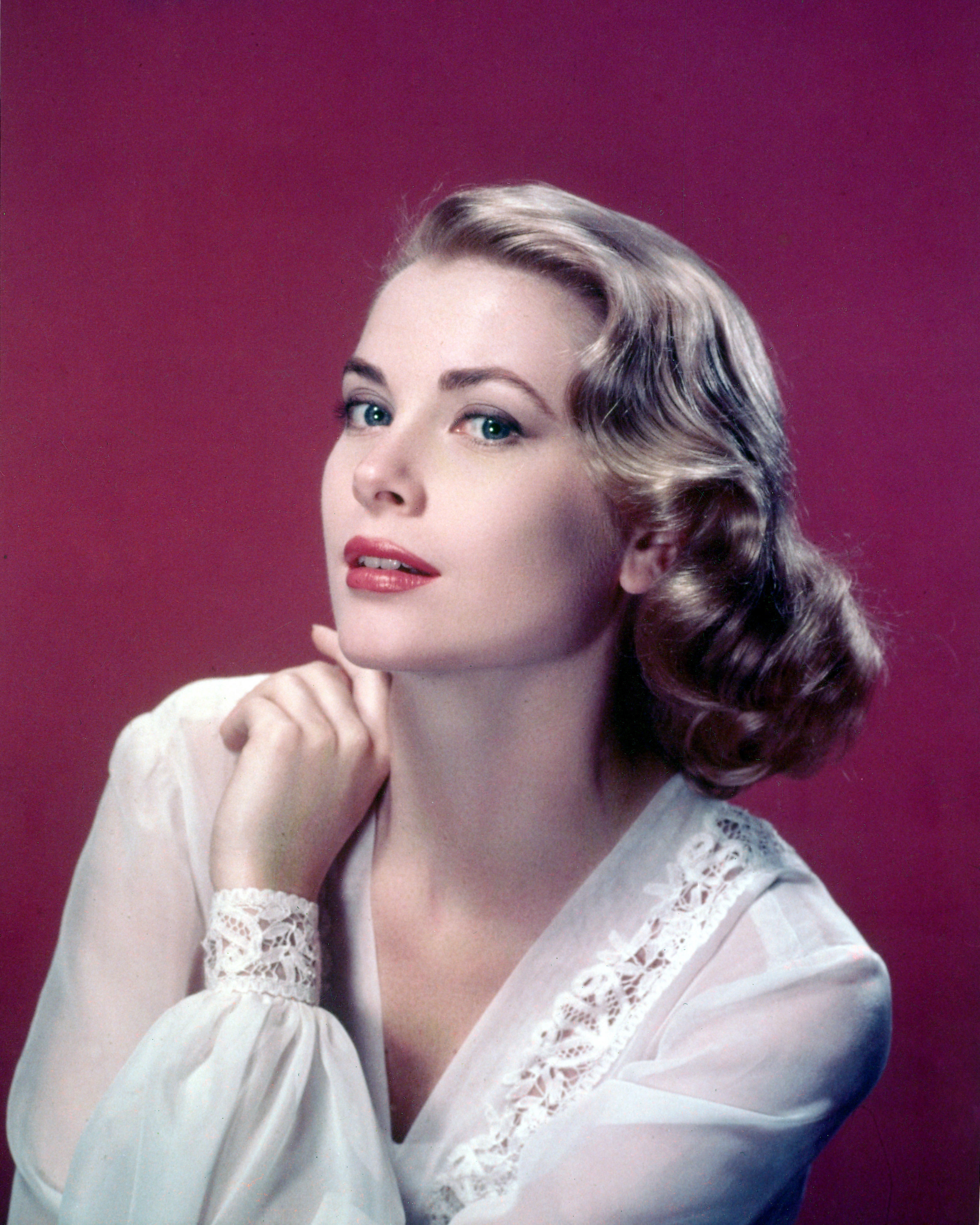 Grace Kelly is pictured in a lace-trimmed top, circa 1955 | Source: Getty Images