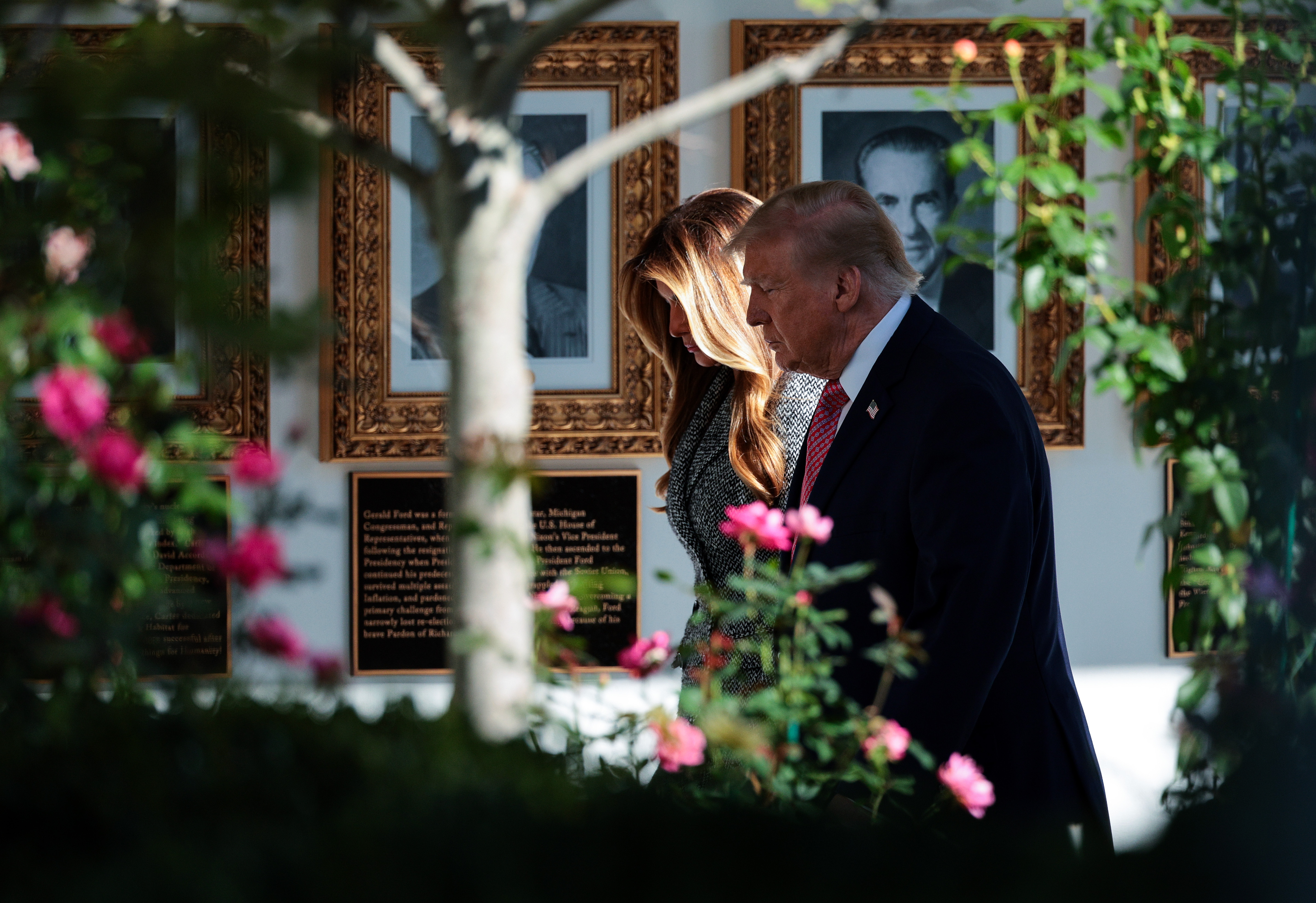 Donald and Melania Trump's public interactions have repeatedly attracted attention from body-language experts and social media users. Their appearance at a recent White House event became another talking point shortly before the Halloween festivities. | Source: Getty Images