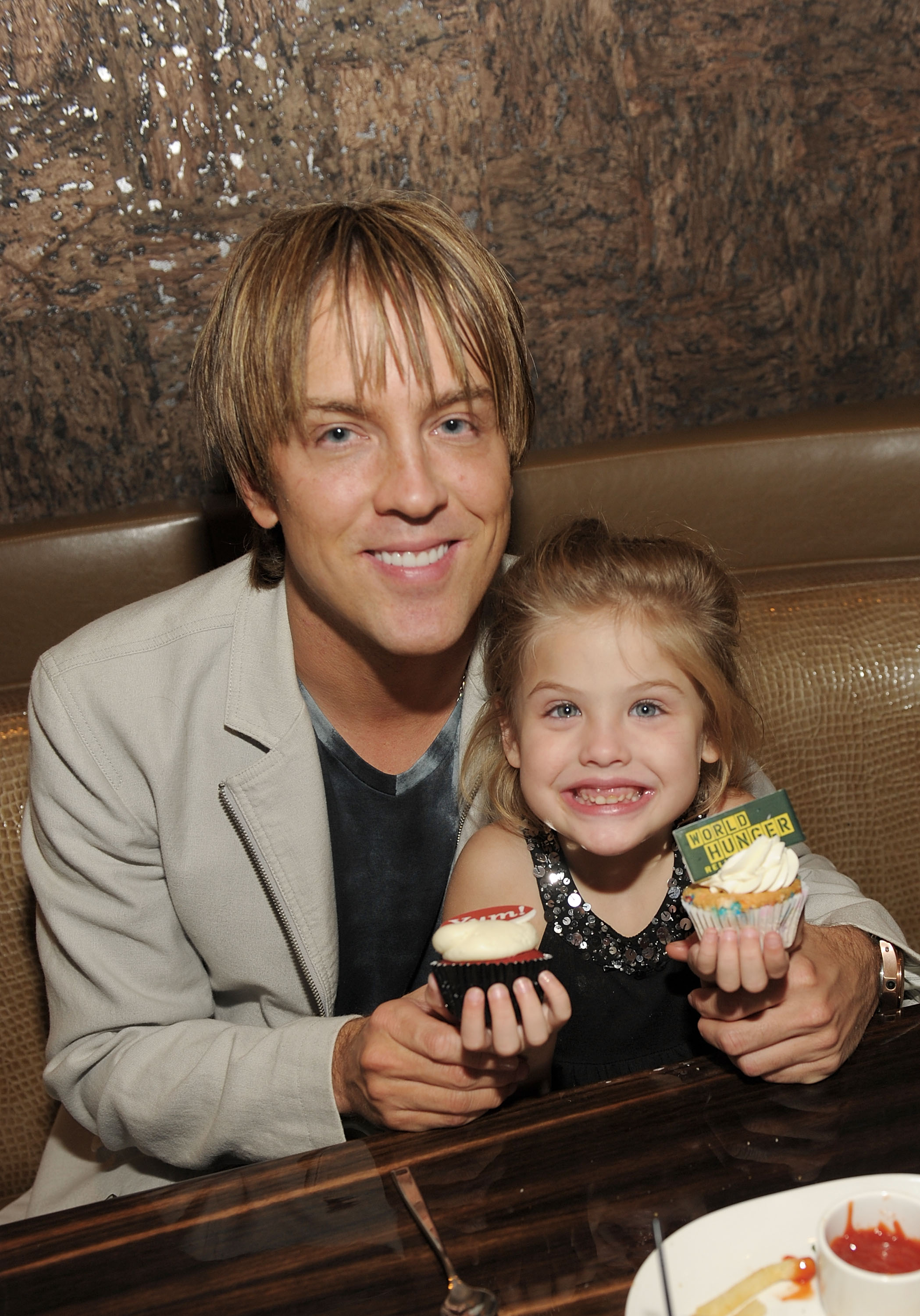 A wide, toothy grin lit up 4-year-old Dannielynn Birkhead's face as she proudly showed off frosted cupcakes at Beso restaurant in Las Vegas on October 11, 2010. Dressed up for the World Hunger Relief fundraiser in a sparkling sequined black top, her sandy-blonde hair pulled into a half-up style framed sparkling blue eyes full of pure, bubbly childhood charm.