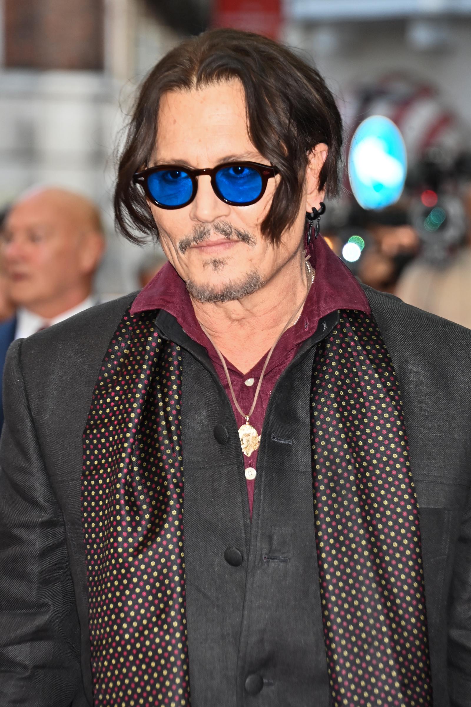 Johnny Depp appears in good spirits at the London premiere of "Modigliani: Three Days on the Wing of Madness" | Source: Getty Images