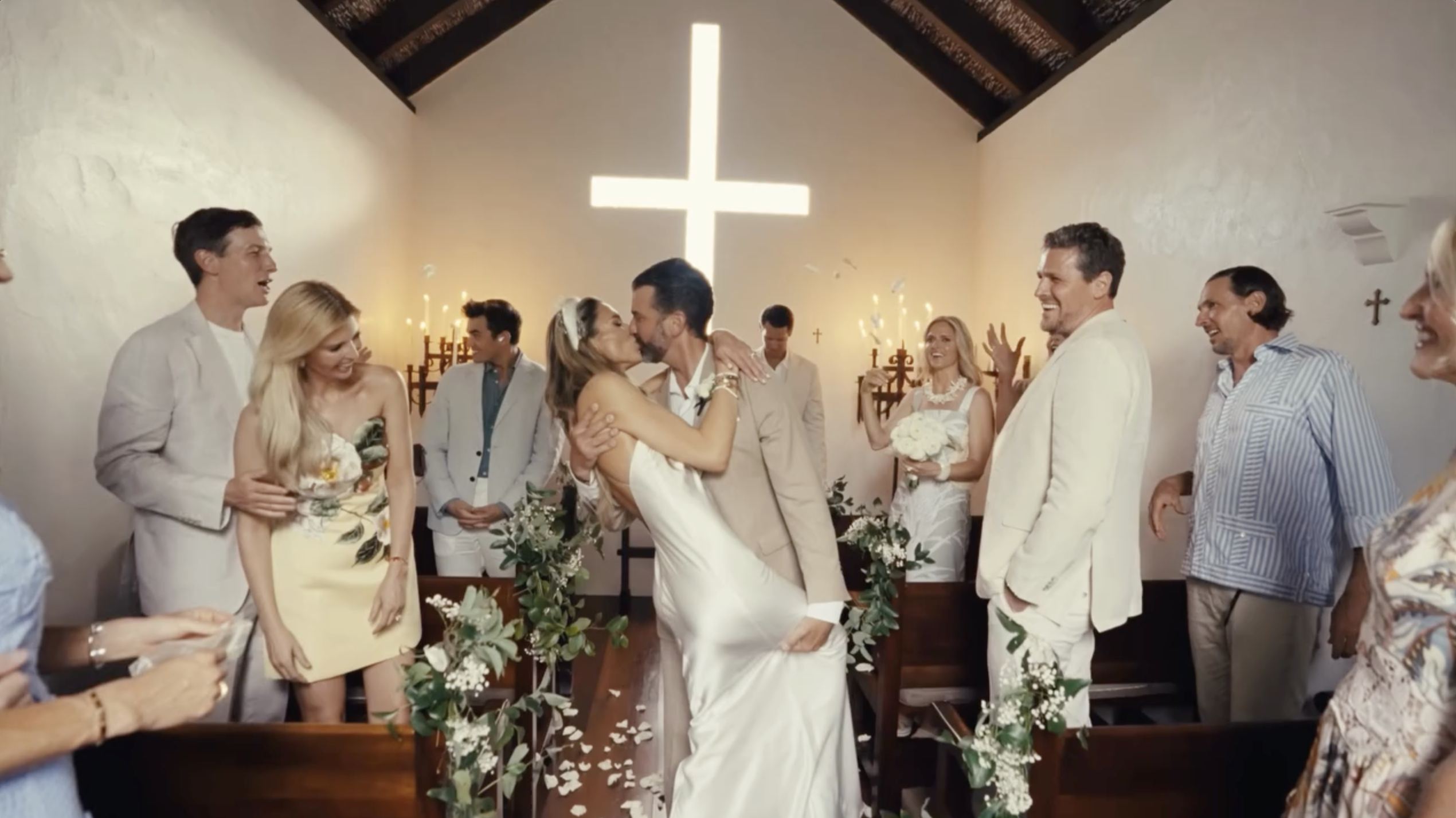 Surrounded by family and friends, Donald Trump Jr. and Bettina Anderson share another kiss inside the chapel after the ceremony. | Source: Instagram/donaldjtrumpjr