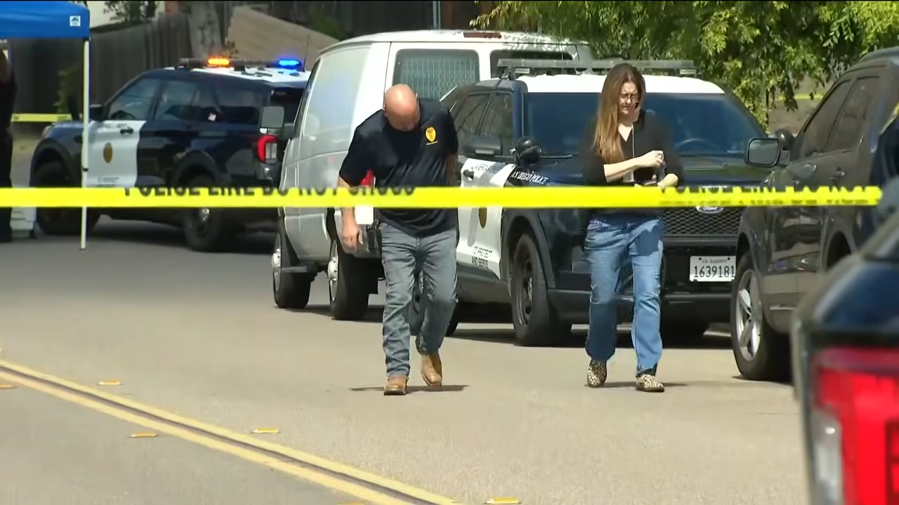 Investigators walk through the secured area near the San Carlos home where Amy, David, and Mya Voight were found dead. | Source: YouTube/FOX 5 San Diego