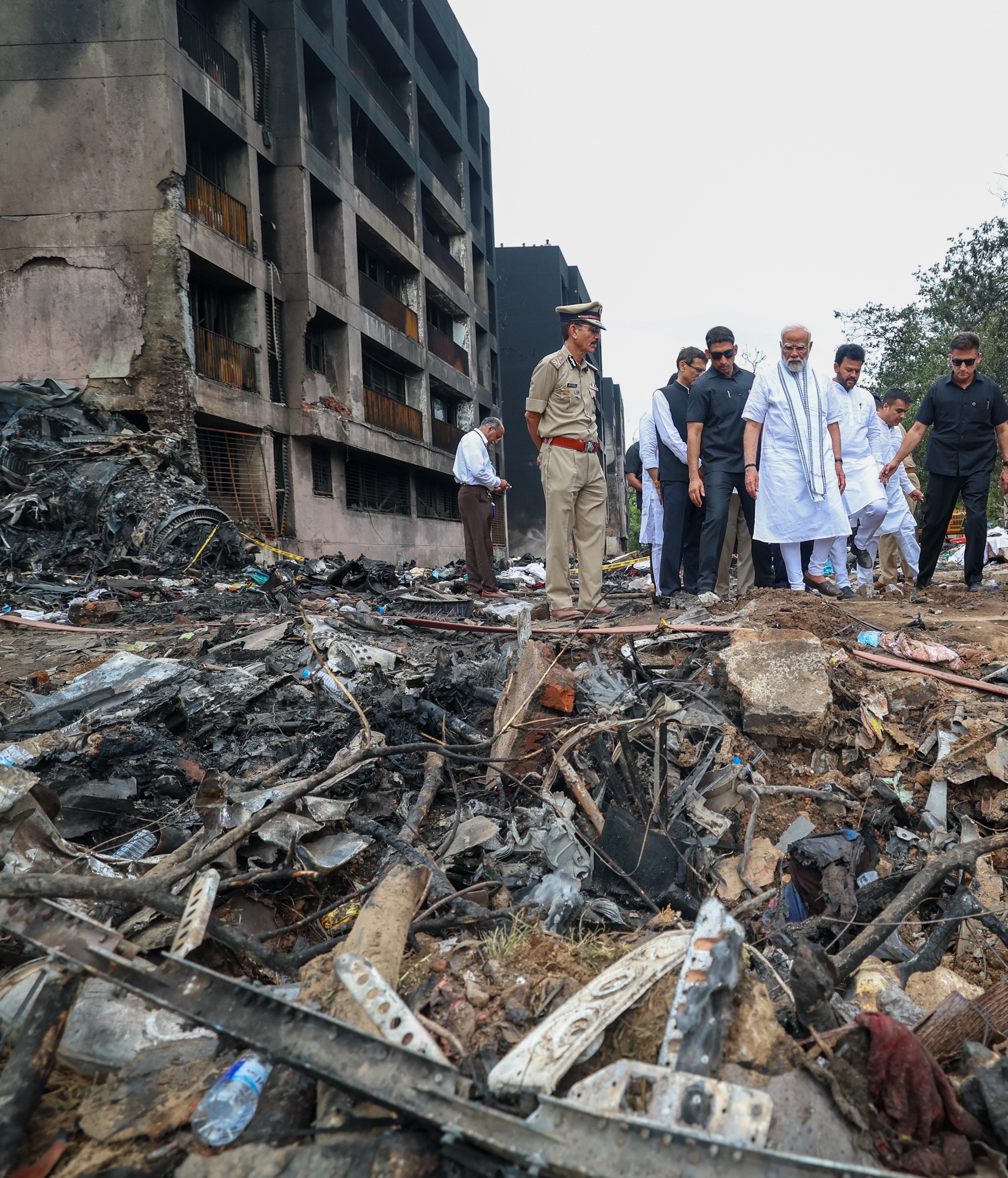 Charred buildings photographed after Air India flight 171 crashed in a residential area near the airport in Ahmedabad, on June 13, 2025 | Source: Getty Images