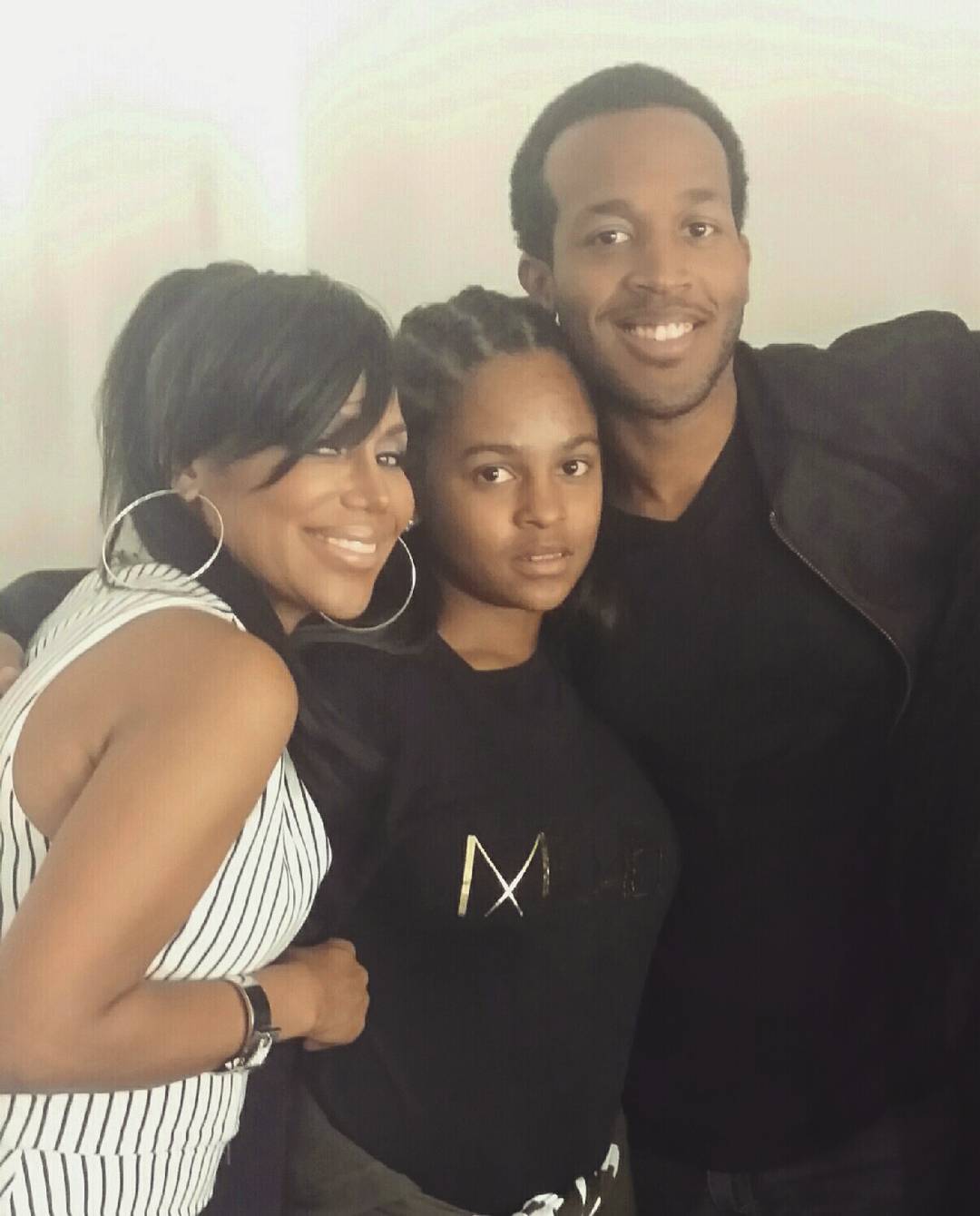 Marcel Young photographed with his mother and sister, from a post dated January 18, 2016 | Source: Instagram/michellemuzic