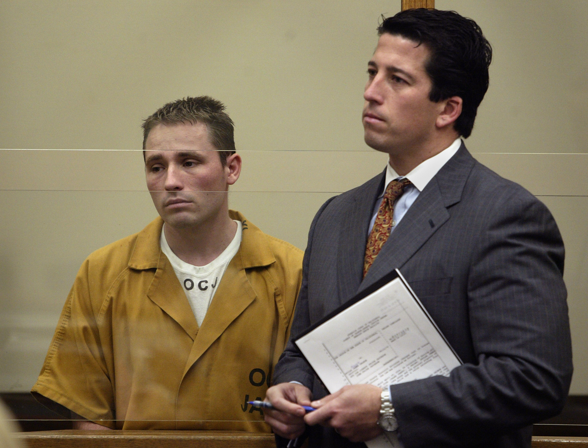 Skylar Deleon stood in custody beside his attorney, T. Edward Welbourn, during a court appearance at Superior Court in Newport Beach on January 4, 2005. Wearing an Orange County Jail uniform as Welbourn held court documents beside him, the actor appeared before the court after being linked to the purchase of a yacht belonging to a Prescott, Arizona, couple who were missing at the time.