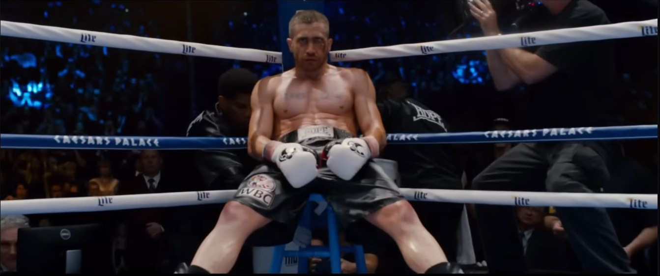 Jake Gyllenhaal's remarkable physical transformation was on full display during an intense boxing scene from "Southpaw," highlighting the muscular build he developed through months of rigorous training and strict discipline. His dedication helped bring the grit, endurance, and presence of champion boxer Billy Hope to the screen. | Source: YouTube/Rotten Tomatoes Trailers