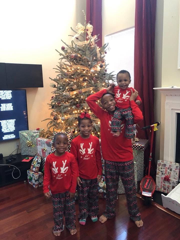 Karmelo Anthony poses with his younger siblings, from a post dated December 2017 | Source: Facebook/drew.anthony.37