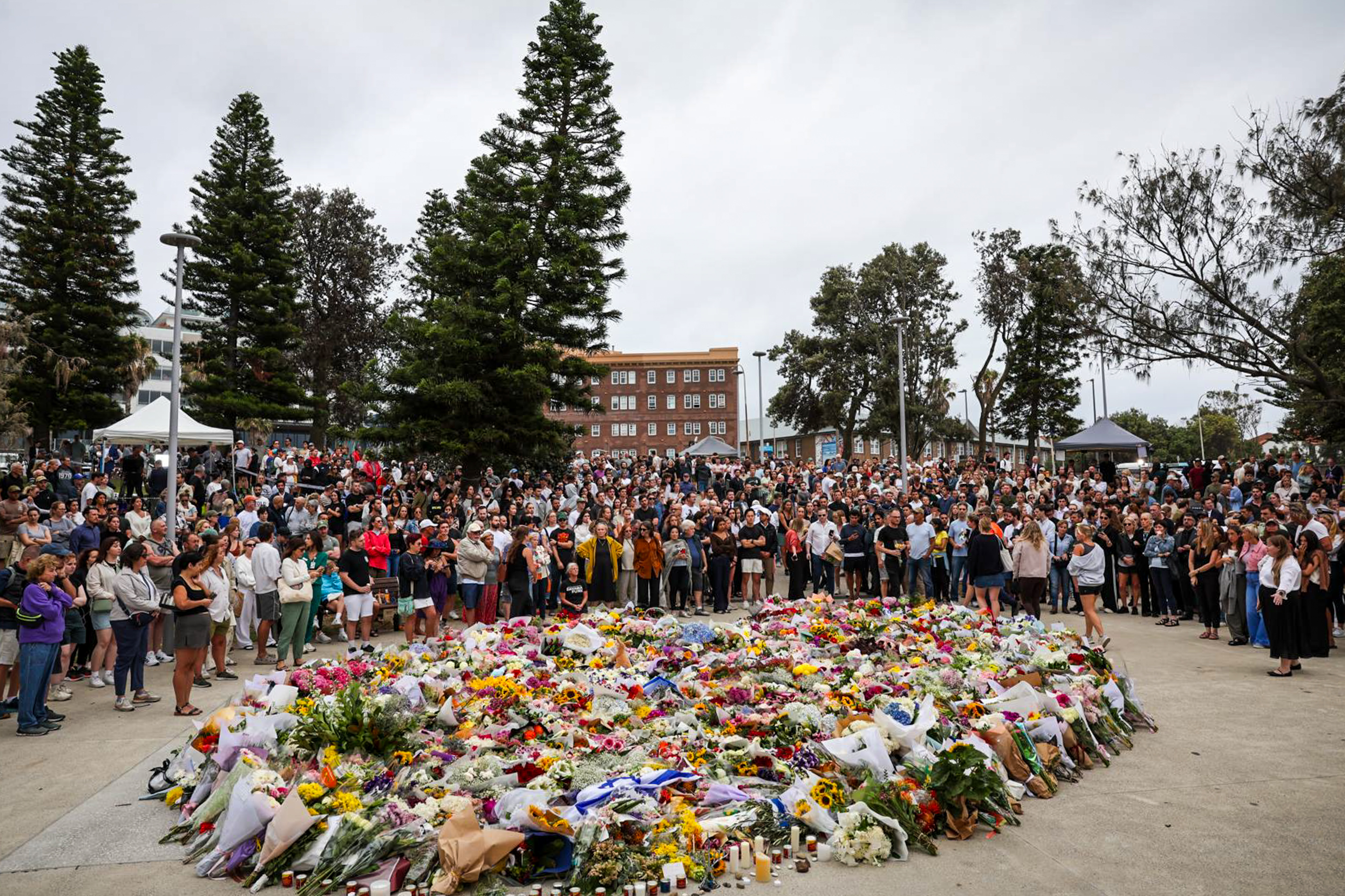 People lay flowers at Bondi Beach in Sydney, Australia on December 15, 2025. | Source: Getty Images