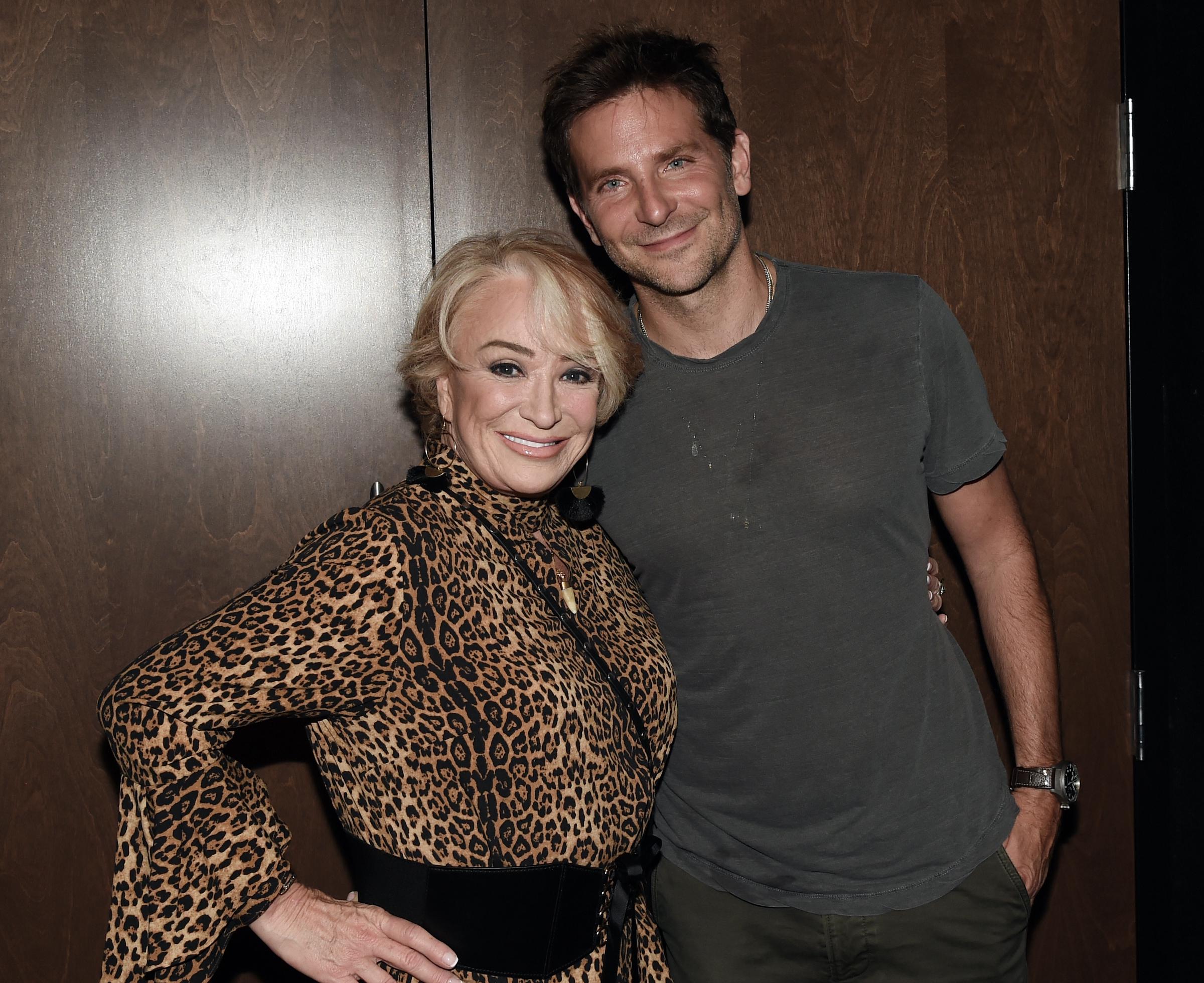 Cooper appeared slightly older here, with defined laugh lines around his eyes and faint forehead creases, and a short stubble covering his jawline. His light-brown hair was cut short and slightly spiky as he stood next to Tanya Tucker at the "A Star Is Born" screening at AMC DINE-IN Thoroughbred 20 on September 18, 2018, in Franklin, Tennessee.