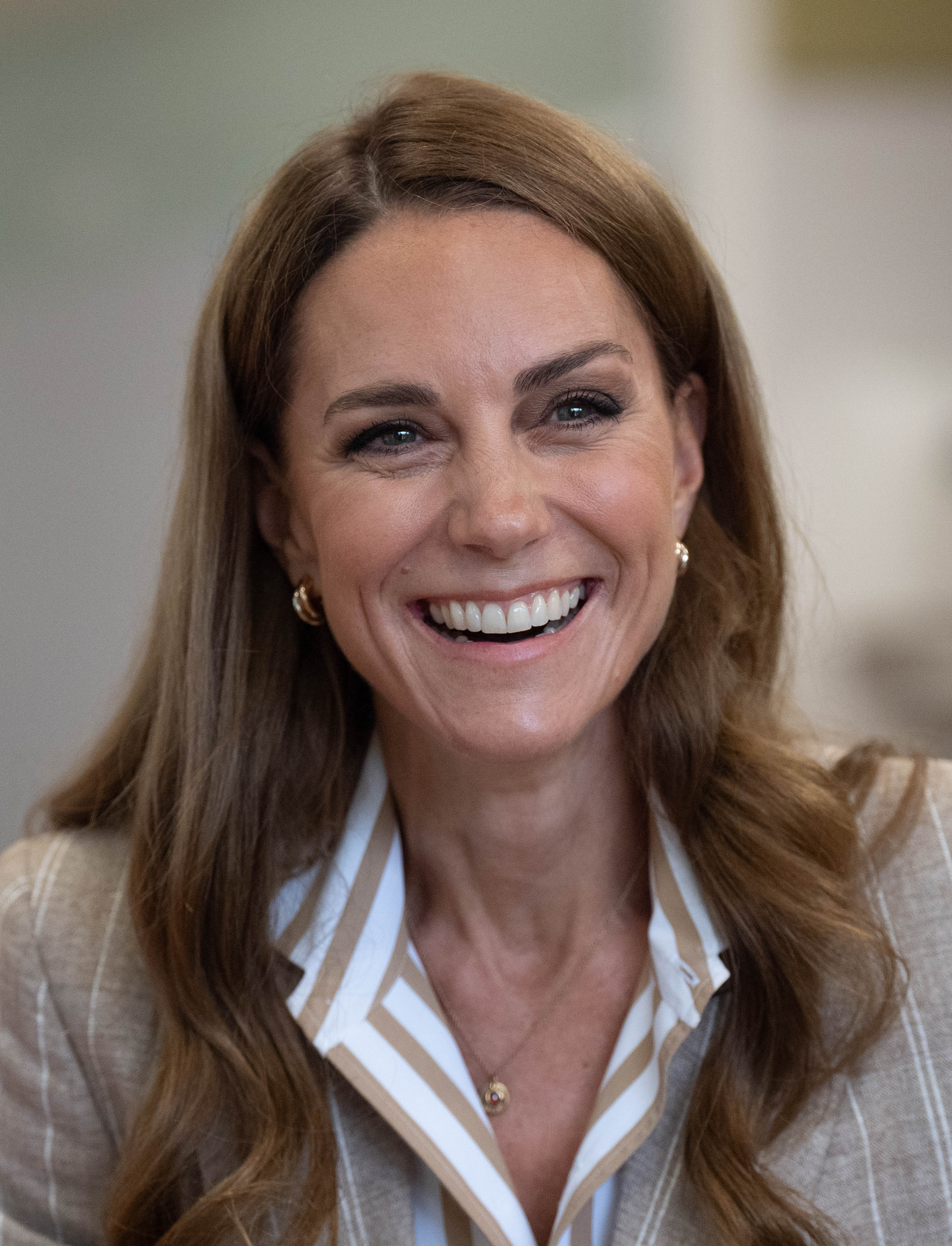 Beaming brightly, Princess Catherine shares a warm smile during her tour of the RHS's Wellbeing Garden at Colchester Hospital. Her visit highlights the donation of 50 Catherine's Rose plants supporting the Royal Marsden Cancer Charity.