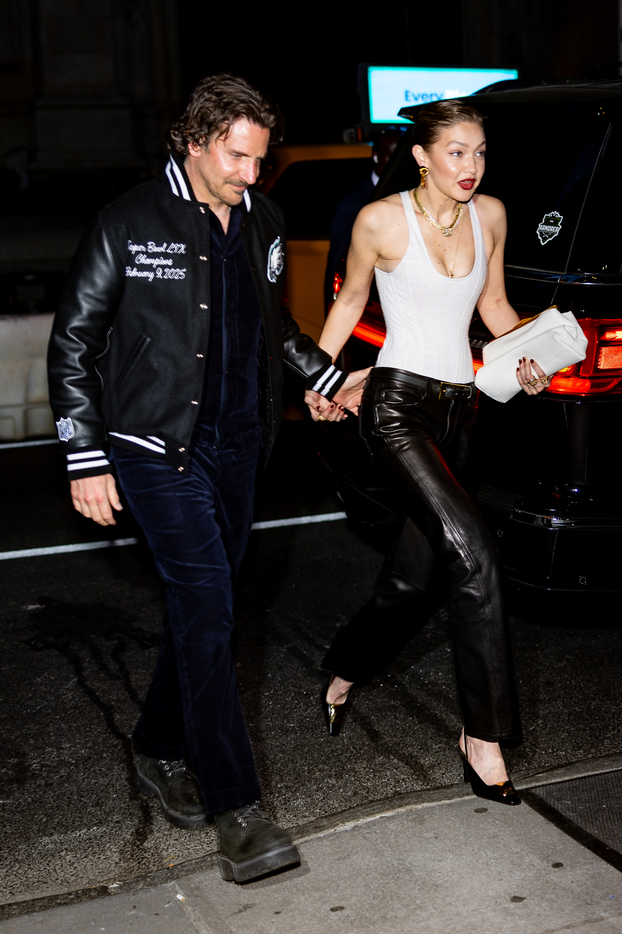 Bradley Cooper holding Gigi Hadid's waist during date night | Source: Getty Images