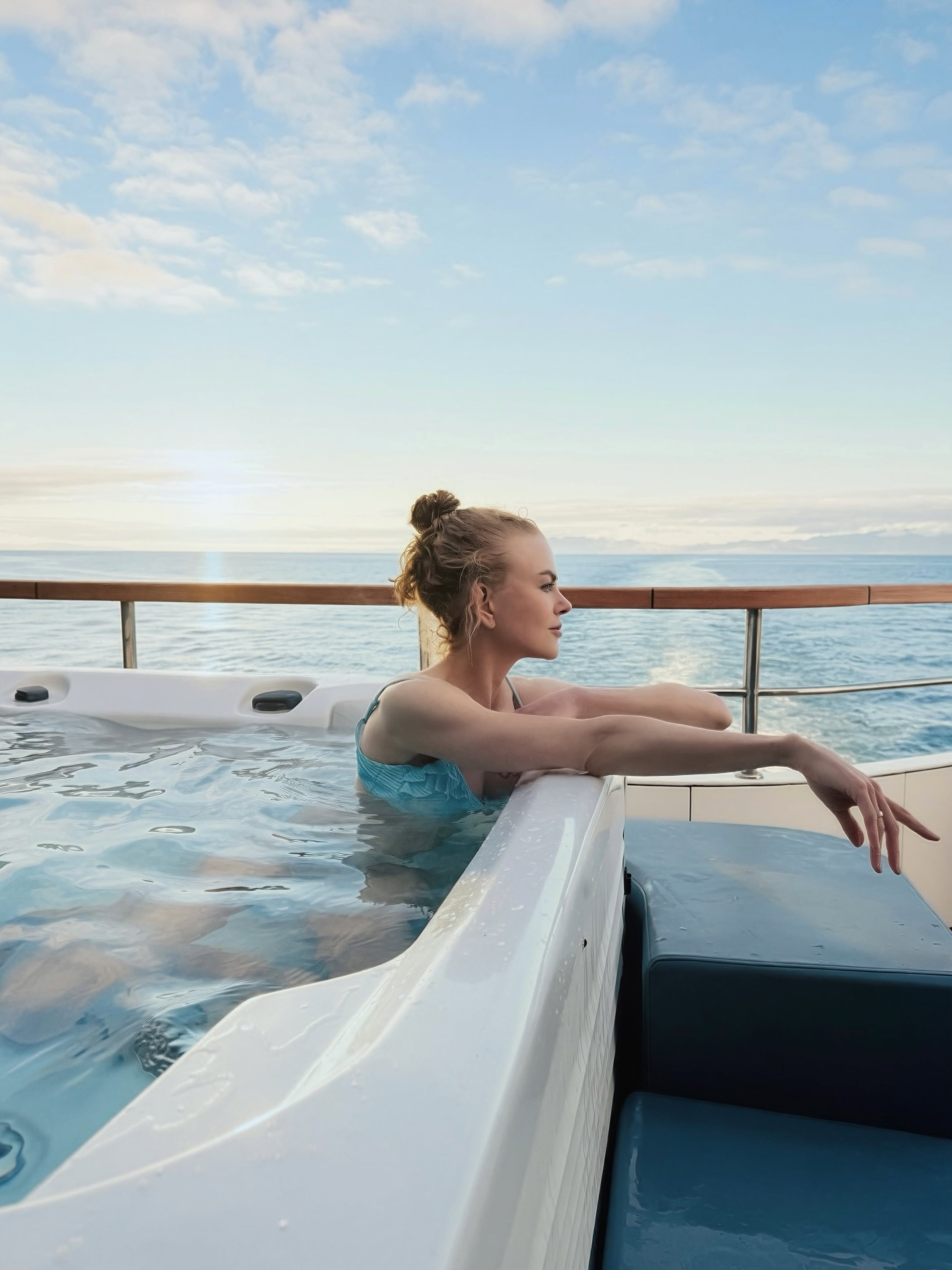 Taking relaxation to the next level, the actress unwinds in an onboard hot tub as the ship navigates northern waters. Sweeping her hair up into a sleek bun, she took in panoramic ocean views from the deck. | Source: Instagram/nicolekidman