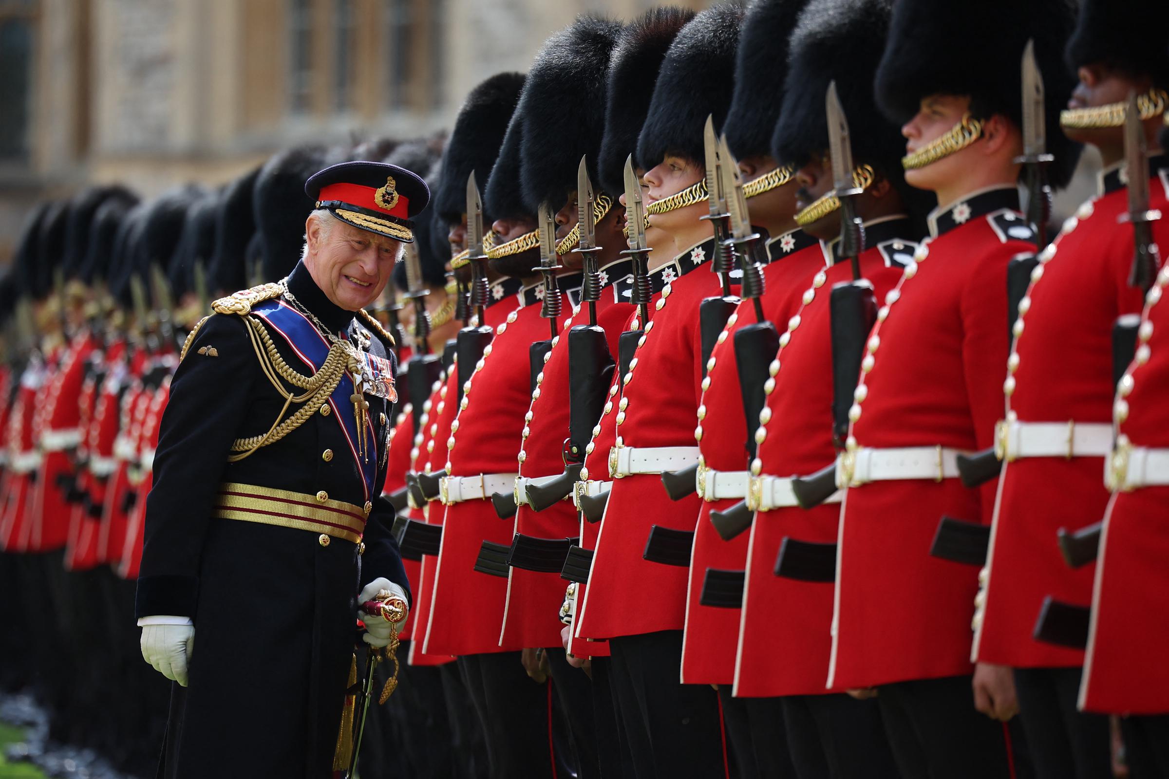 King Charles III, Colonel in Chief of the Coldstream Guards inspects the regiment at Windsor Castle, west of London, on June 13, 2025 | SOurce: Getty Images