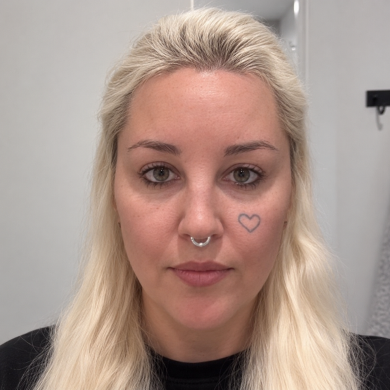 This AI rendering offers a softer take on the same close-up, with blond hair and natural-looking brows. | Source: Chat GPT