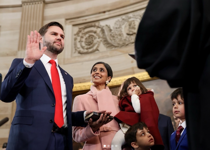 JD Vance takes the oath as the 50th U.S. vice president as his wife, Usha, stands beside him holding one of their children. | Source: Instagram/vp