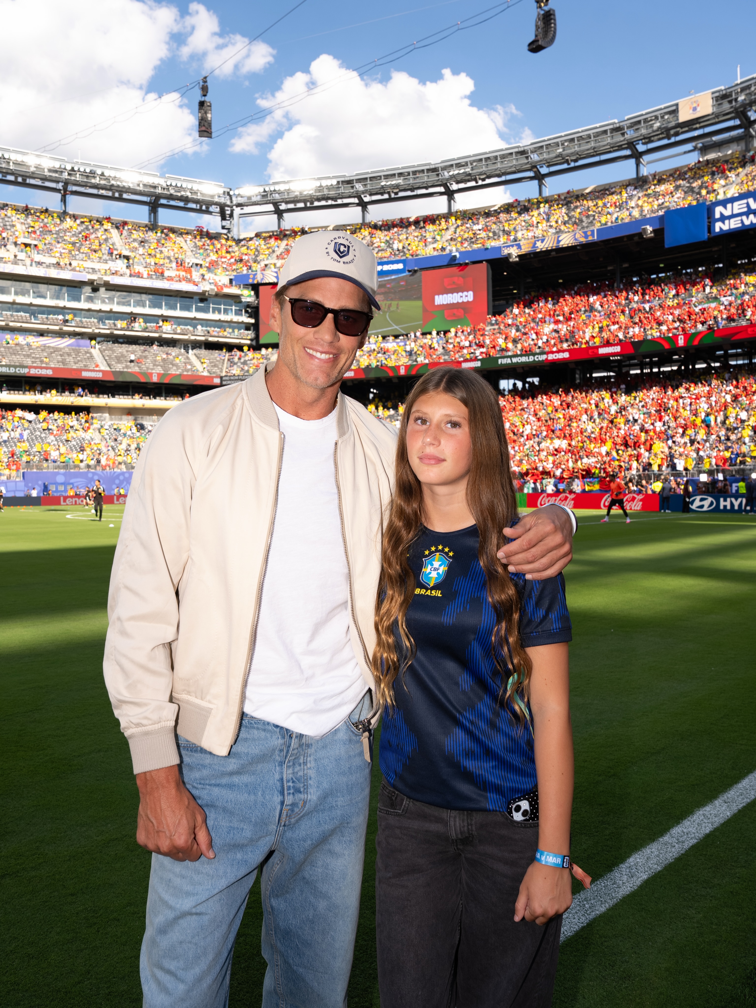 Vivian's appearance at the tournament renewed claims that she is becoming her supermodel mother's "mini-me." Her Brazil jersey also offered a meaningful tribute to Bündchen's home country. | Source: Instagram/tombrady