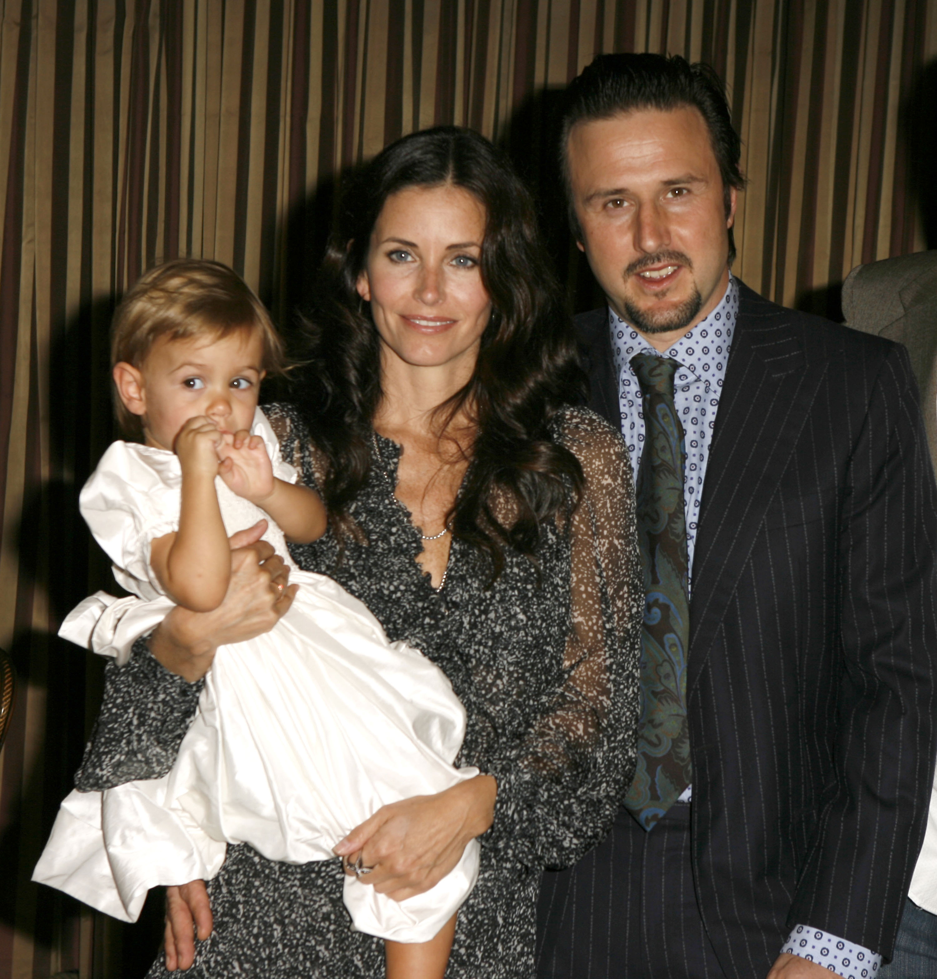 Courteney Cox and David Arquette welcomed their daughter Coco in June 2004, with Courteney's close friend and "Friends" co-star Jennifer Aniston becoming her godmother. | Source: Getty Images