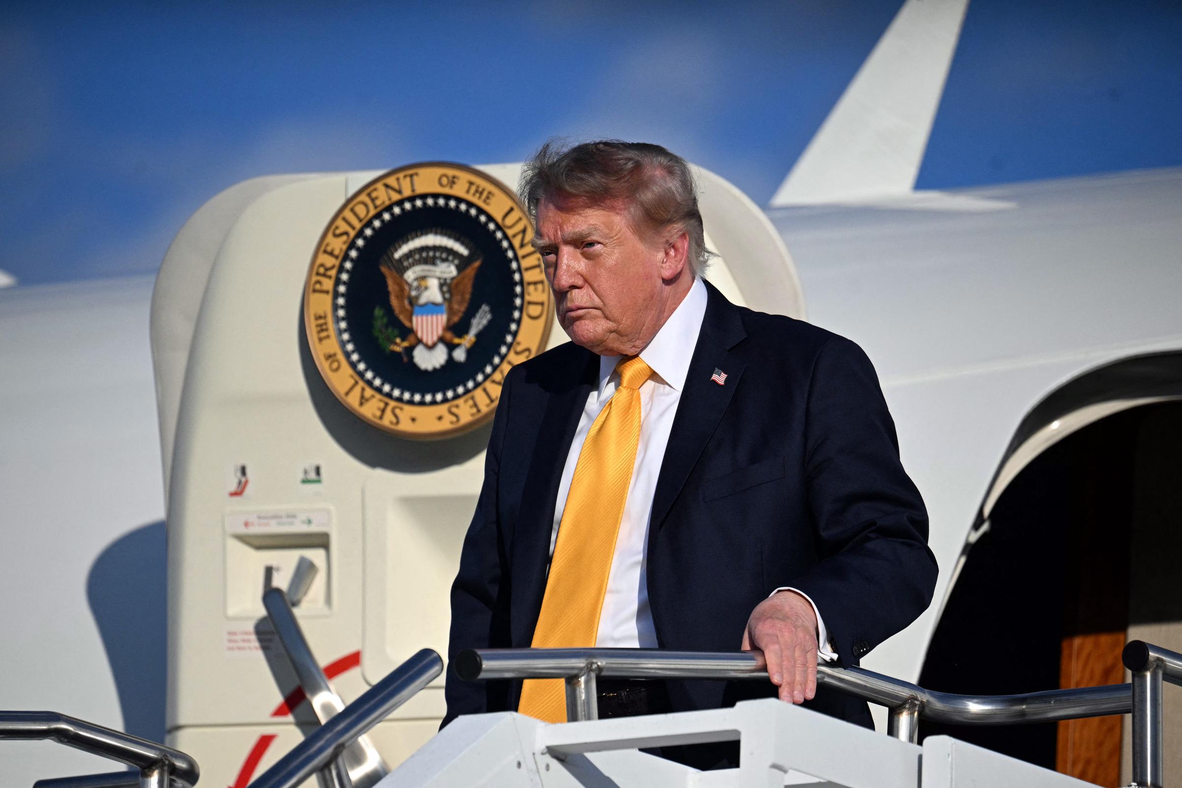 Donald Trump's dramatically darker hair marks a striking departure from his recent golden-blond look as he steps off Air Force One in Morristown, New Jersey, on September 4, 2026.