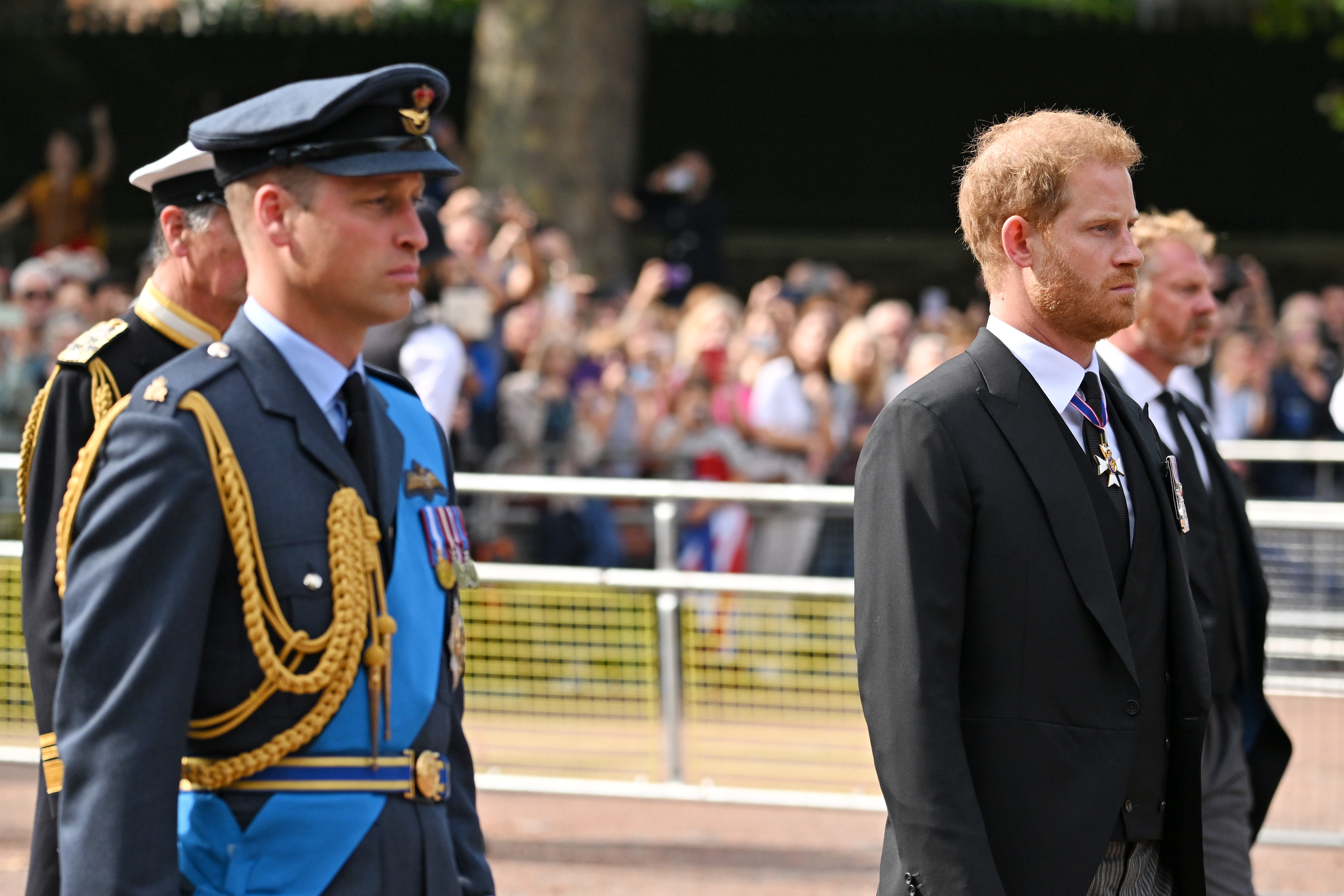 Prince William and Prince Harry take part in the procession for Queen Elizabeth II's lying-in-state in London on September 14, 2022. Their shared public appearances during the mourning period came years before Harry's return created a new opportunity for the brothers to be in closer proximity. | Source: Getty Images