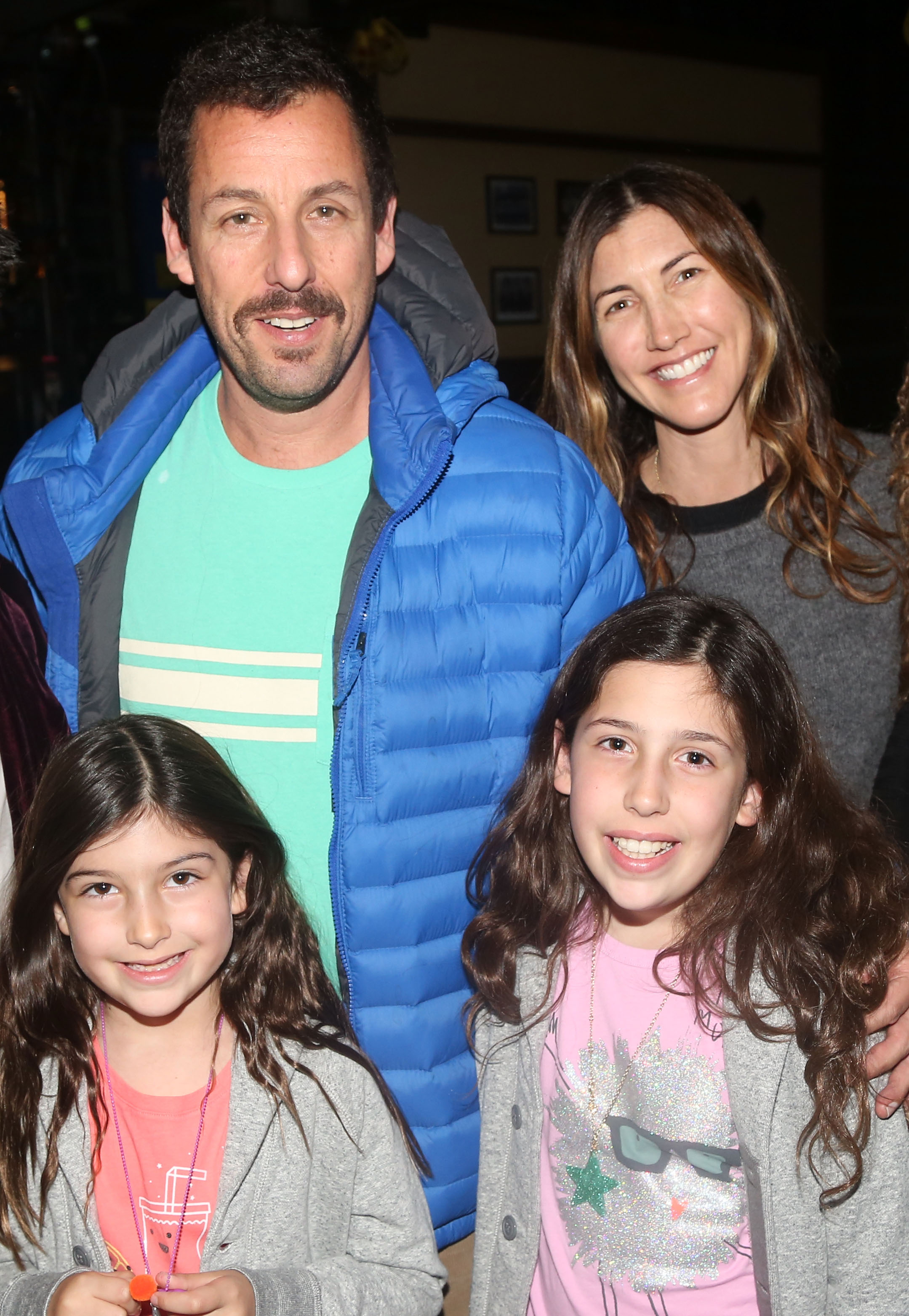 Adam and Jackie Sandler, pictured with daughters Sunny and Sadie in 2016, have long shared public outings with their children, who later pursued acting themselves. | Source: Getty Images
