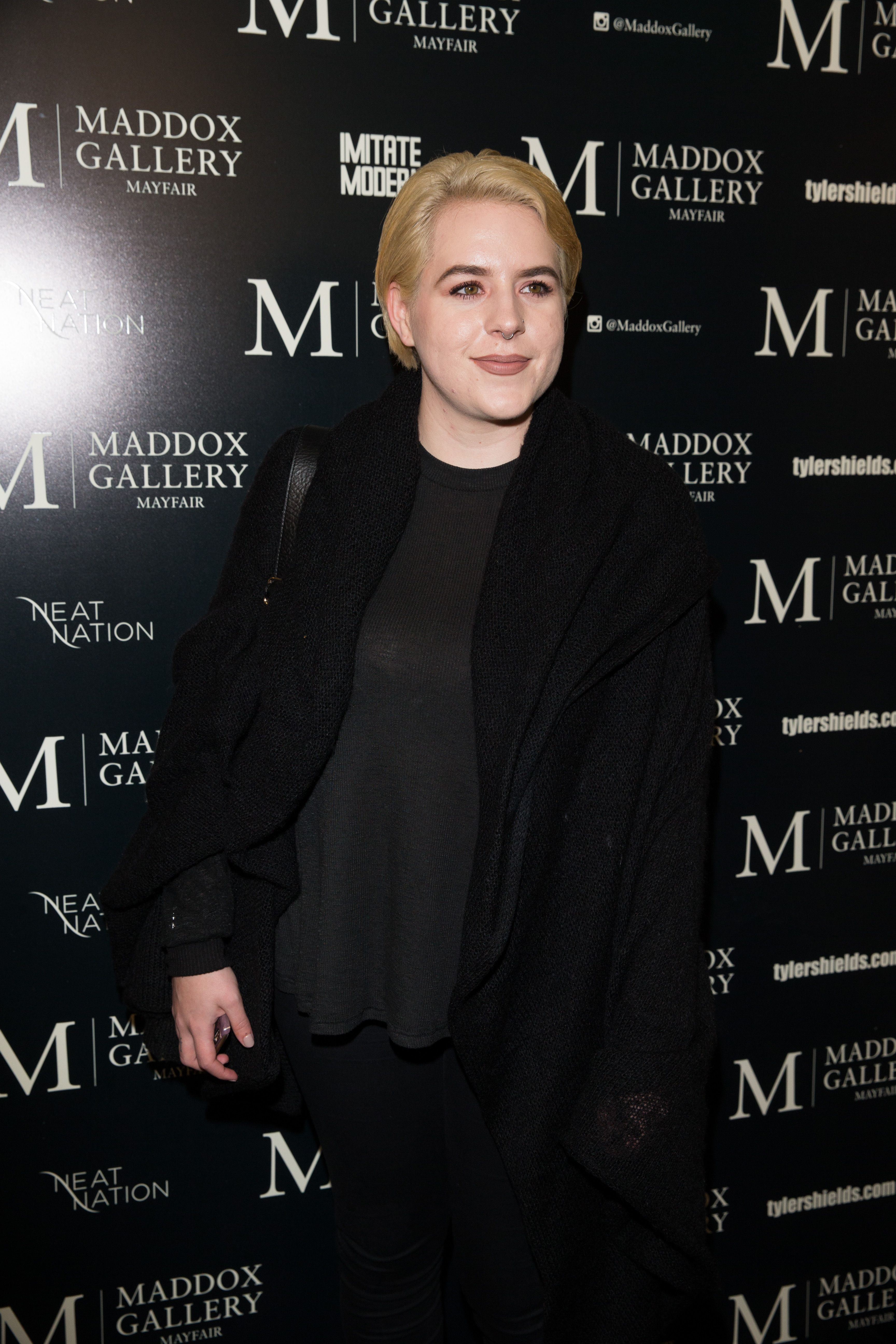 Bella Cruise at the private view of Tyler Shields: Decadence at Maddox Gallery in London, England on February 3, 2016. | Source: Getty Images