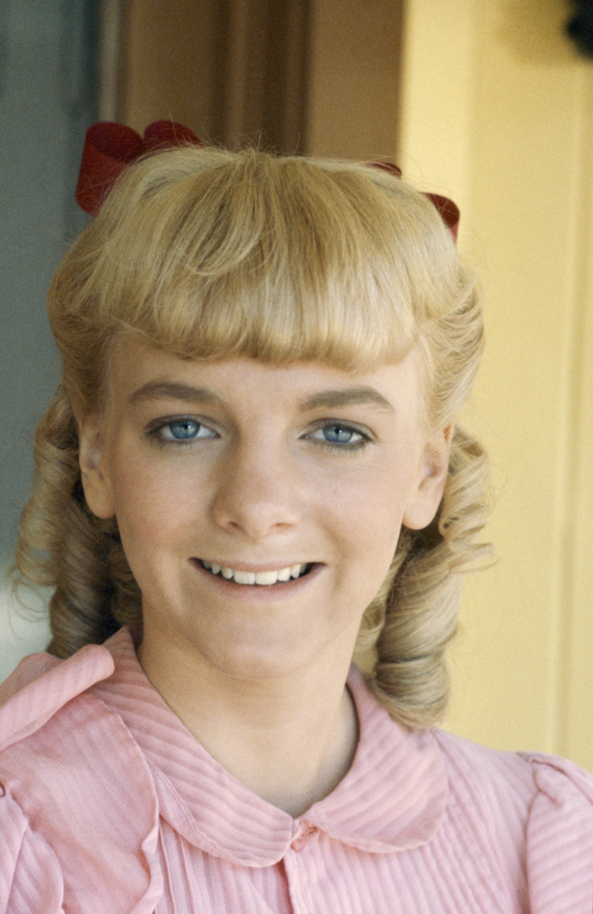 Behind Nellie's signature curls and polished dresses was a character viewers loved to hate. Decades later, that same role continues to shape how audiences recognize Arngrim, even after her surprise return to the "Little House" franchise in a completely different role. | Source: Getty Images