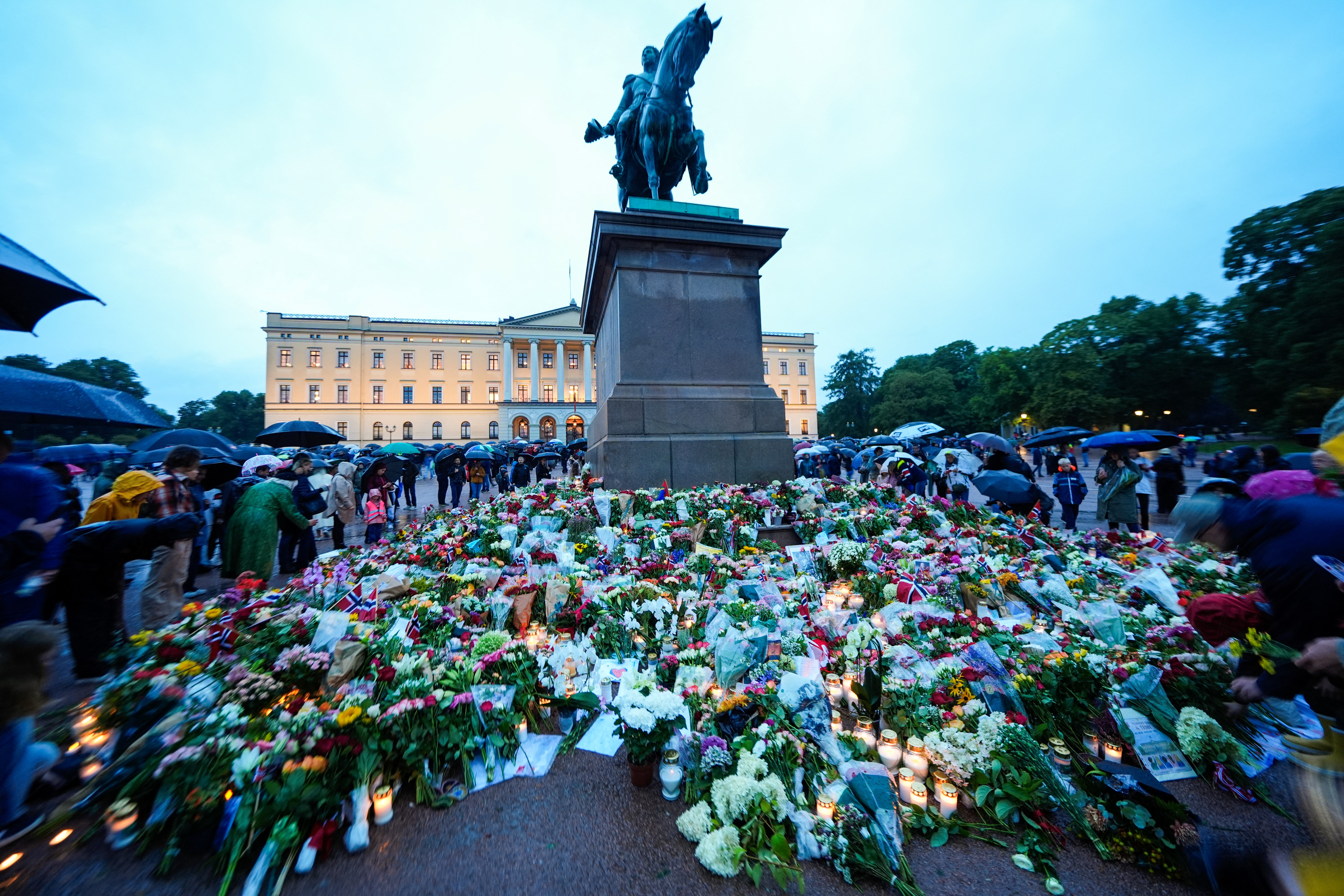 Flowers and candles have been placed in tribute to late King Harald V of Norway at the Palace Square in Oslo on August 28, 2026. European monarchs and world leaders paid tribute on August 28 to Norway's King Harald, after the royal palace announced his death at the age of 89. | Source: Getty Images