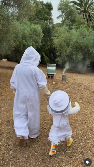 Meghan Markle harvesting honey with Princess Lilibet, posted on May 27, 2025. | Source: Instagram/meghan