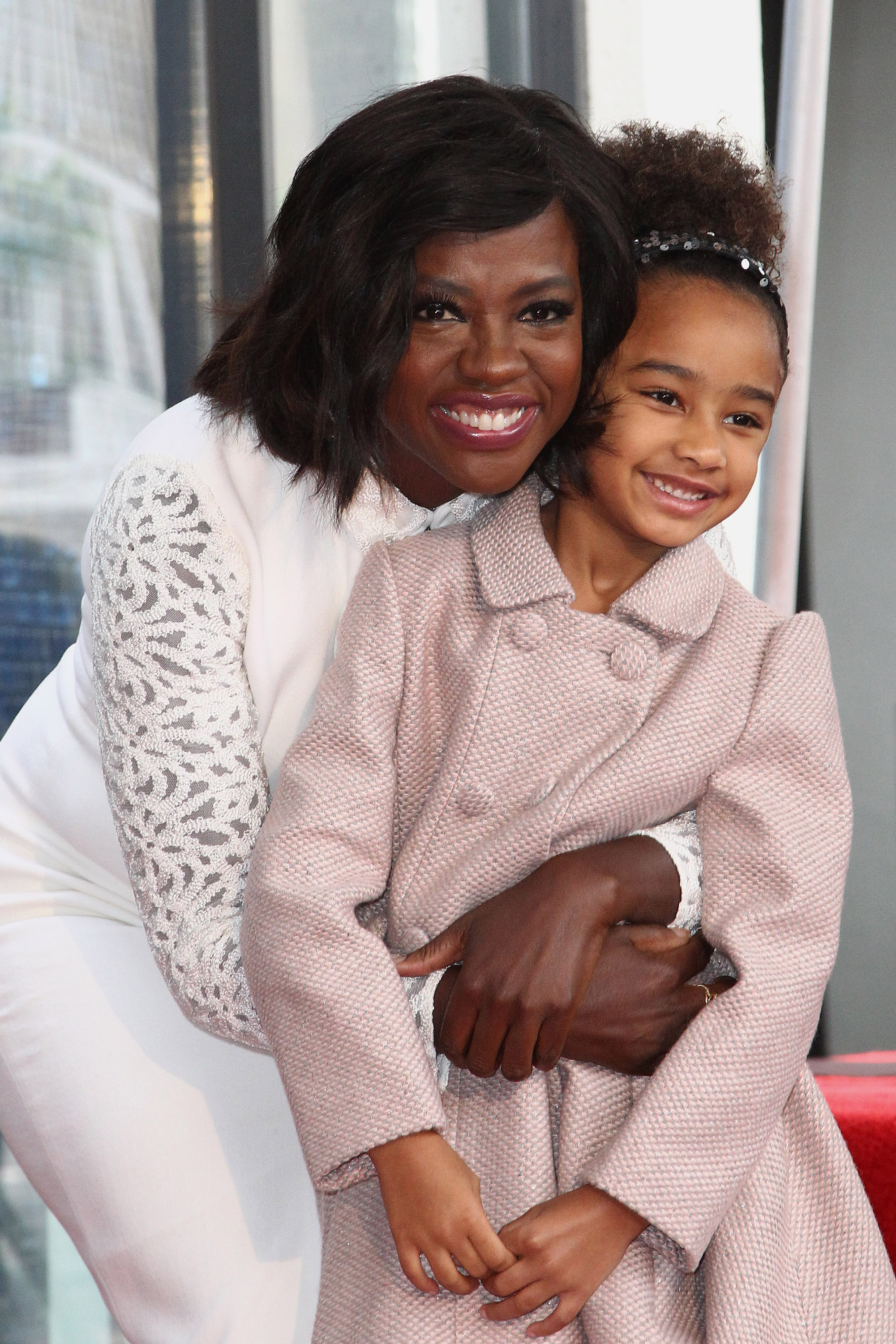 Viola Davis was honored with a star on the Hollywood Walk of Fame and Genesis Tennon was there to celebrate with her mother. She was all smiles during a red-carpet appearance.
