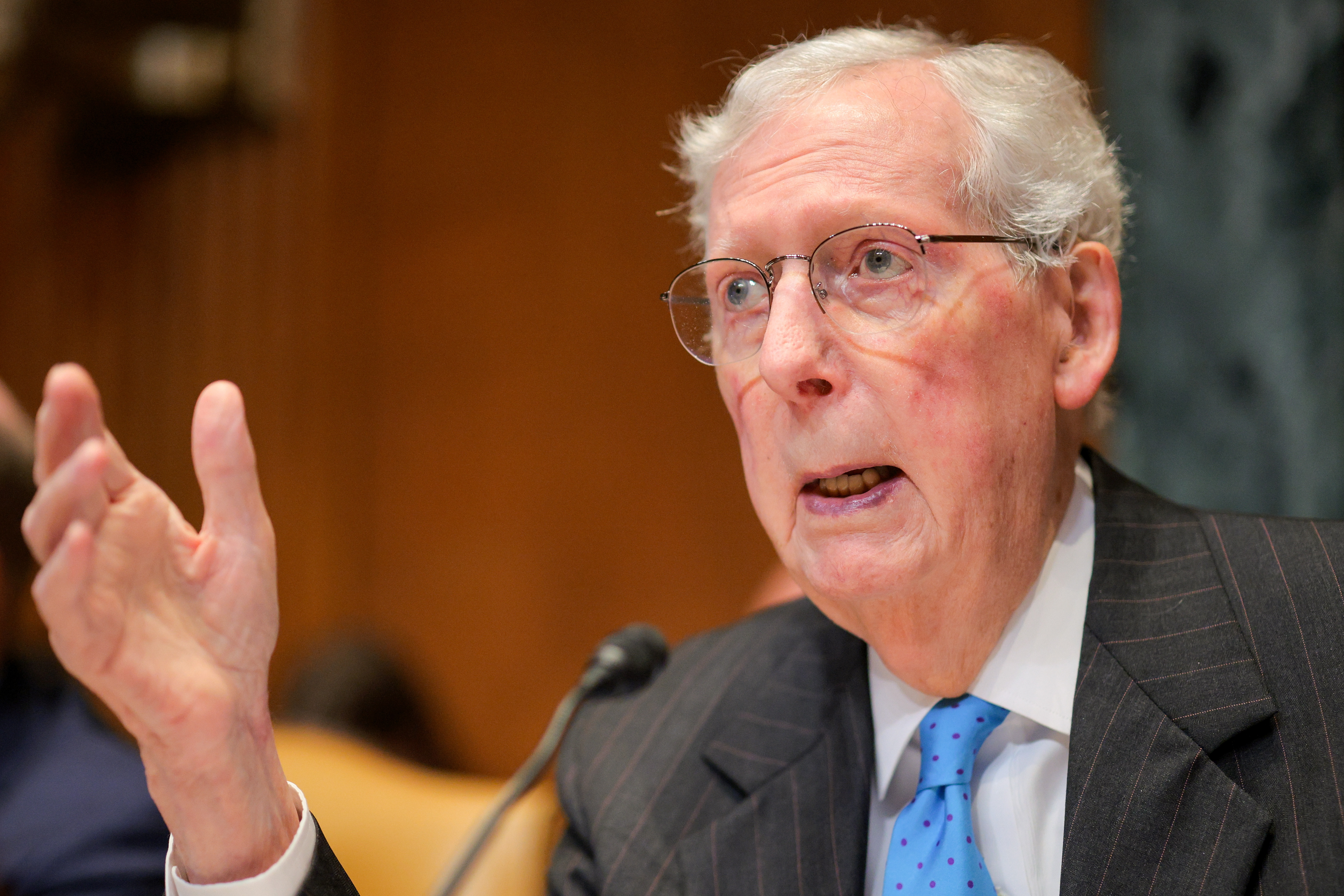 Mitch McConnell speaks during a Senate hearing, as questions surrounding the circumstances of his latest hospitalization continue to draw attention. | Source: Getty Images