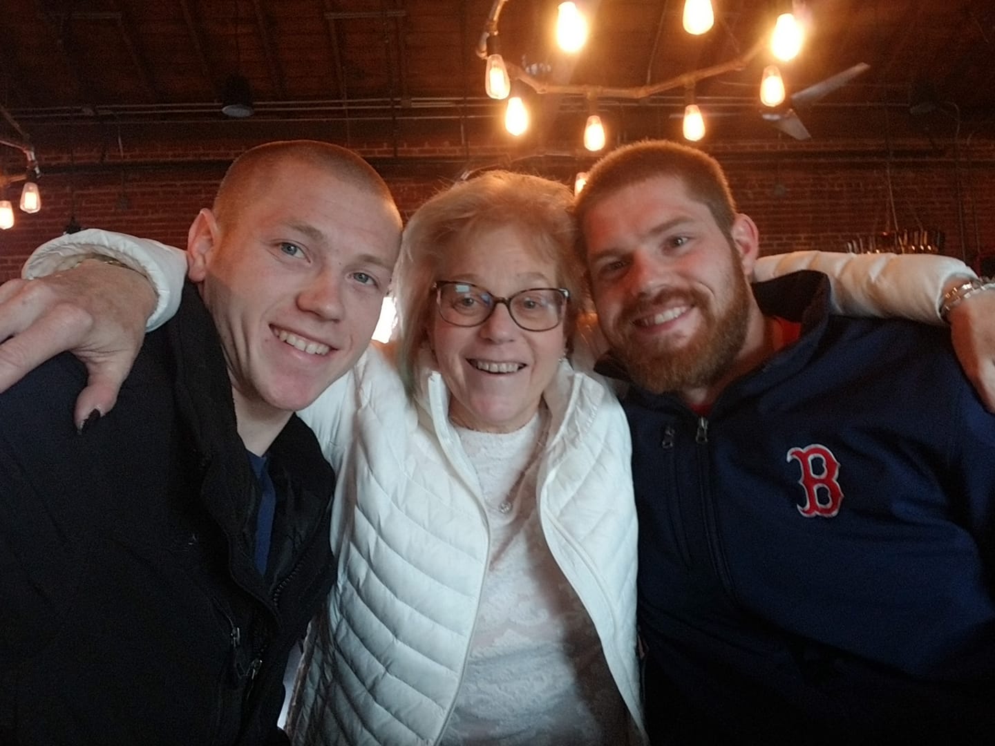 Janet Martin Swallow seen with her sons in a picture dated January 2020 | Source: Facebook/janet.swallow.31