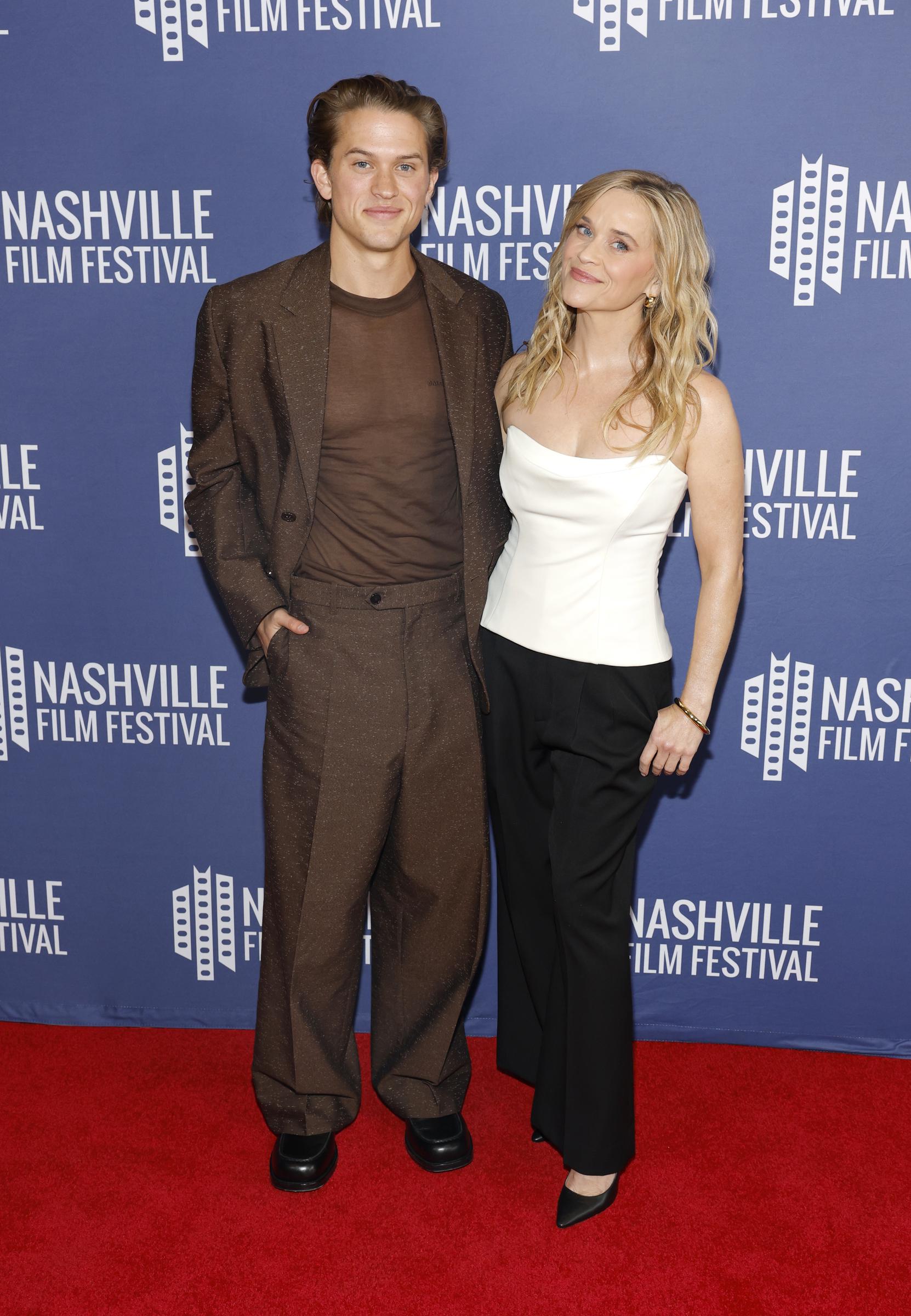 The photo timeline came full circle when Deacon posed beside Reese at his own premiere. Years after he accompanied his mom to her Hollywood events, she was now by his side as he celebrated his first feature film.