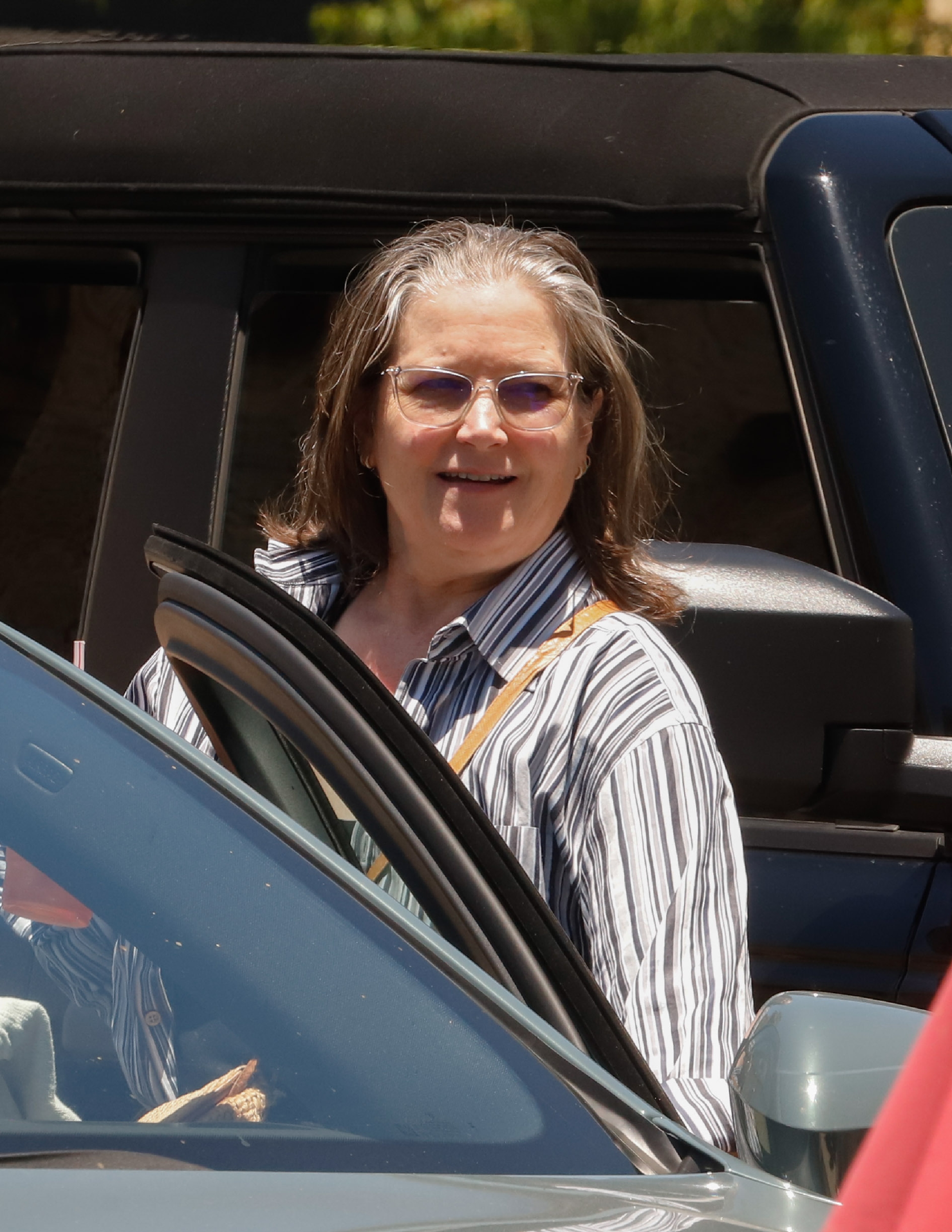 The 2025 photos showed Fonda smiling beside a vehicle with lightly tinted glasses and gray-streaked hair worn loose. The sighting offered another glimpse of the quiet civilian life she had said she preferred. | Source: Getty Images