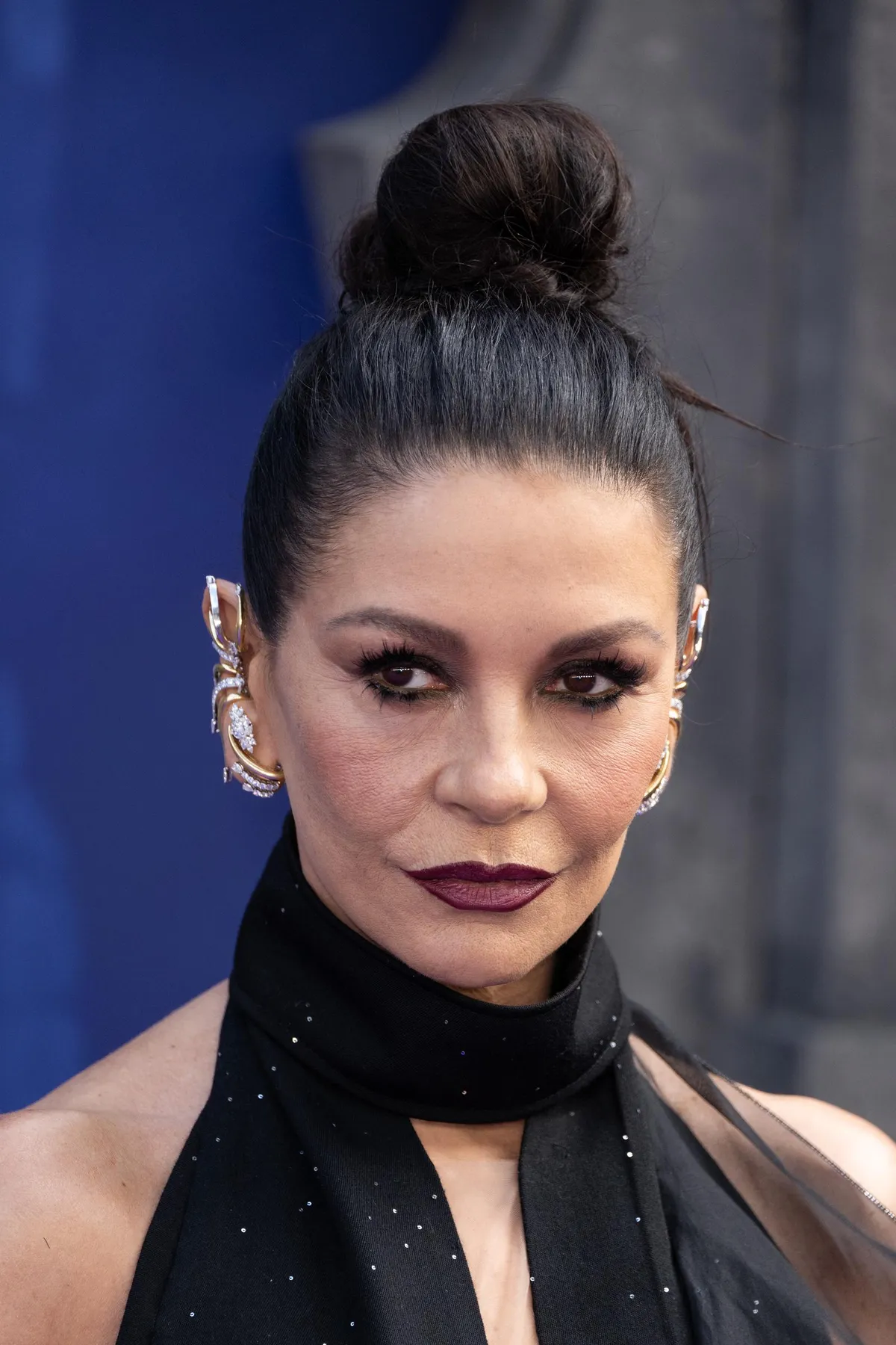 Catherine Zeta-Jones' bold makeup look for the Season 2 Premiere of "Wednesday" on July 30, 2025 in London, England.