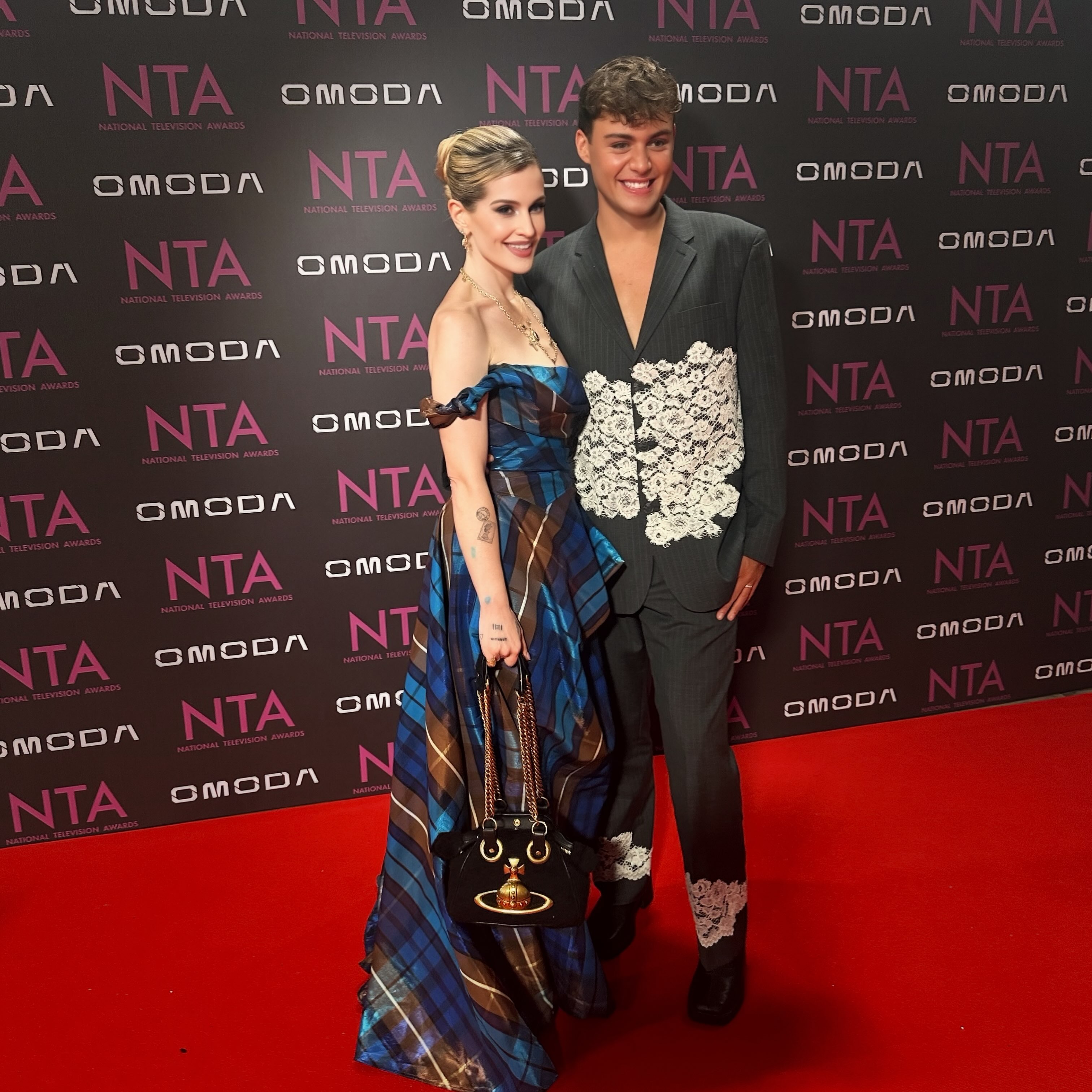 Kelly poses side-by-side on the red carpet with her close friend and date, Bradley Riches. | Source: Instagram/kellyosbourne