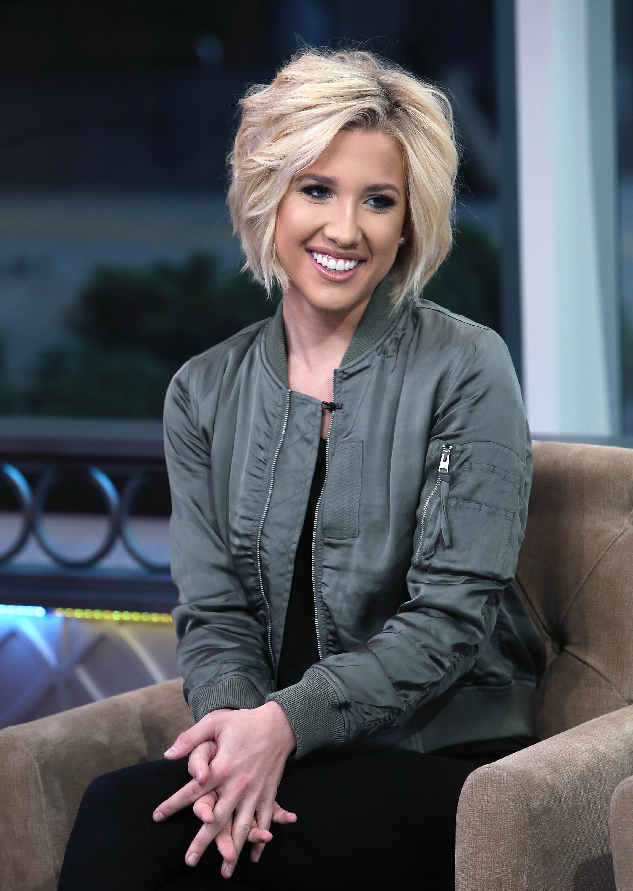 Savannah smiles during an appearance on "Hollywood Today Live" in Hollywood, California, on February 24, 2017. Years later, she credited her fiancé with helping her find happiness and security as they prepare to welcome their first baby together. | Source: Getty Images