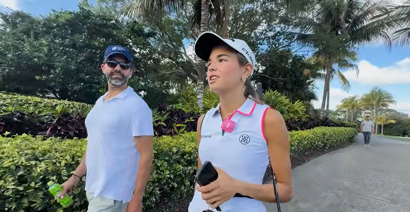 Kai Trump walks alongside her father, Donald Trump Jr., at a golf course in footage shared on April 26, 2026. During their conversation, she explained that her wrist injury had kept her from playing golf for months. | Source: Youtube/kaitrump