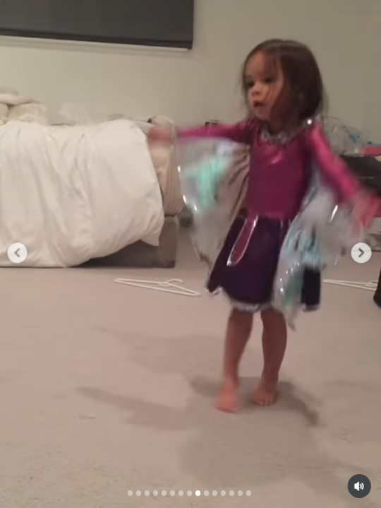 Little Fiona dances with carefree energy, spinning around in her homemade costume as she plays. The joyful childhood moment preserves a glimpse of her personality long before she grew into the girl her family would remember for her creativity and love of dance.
