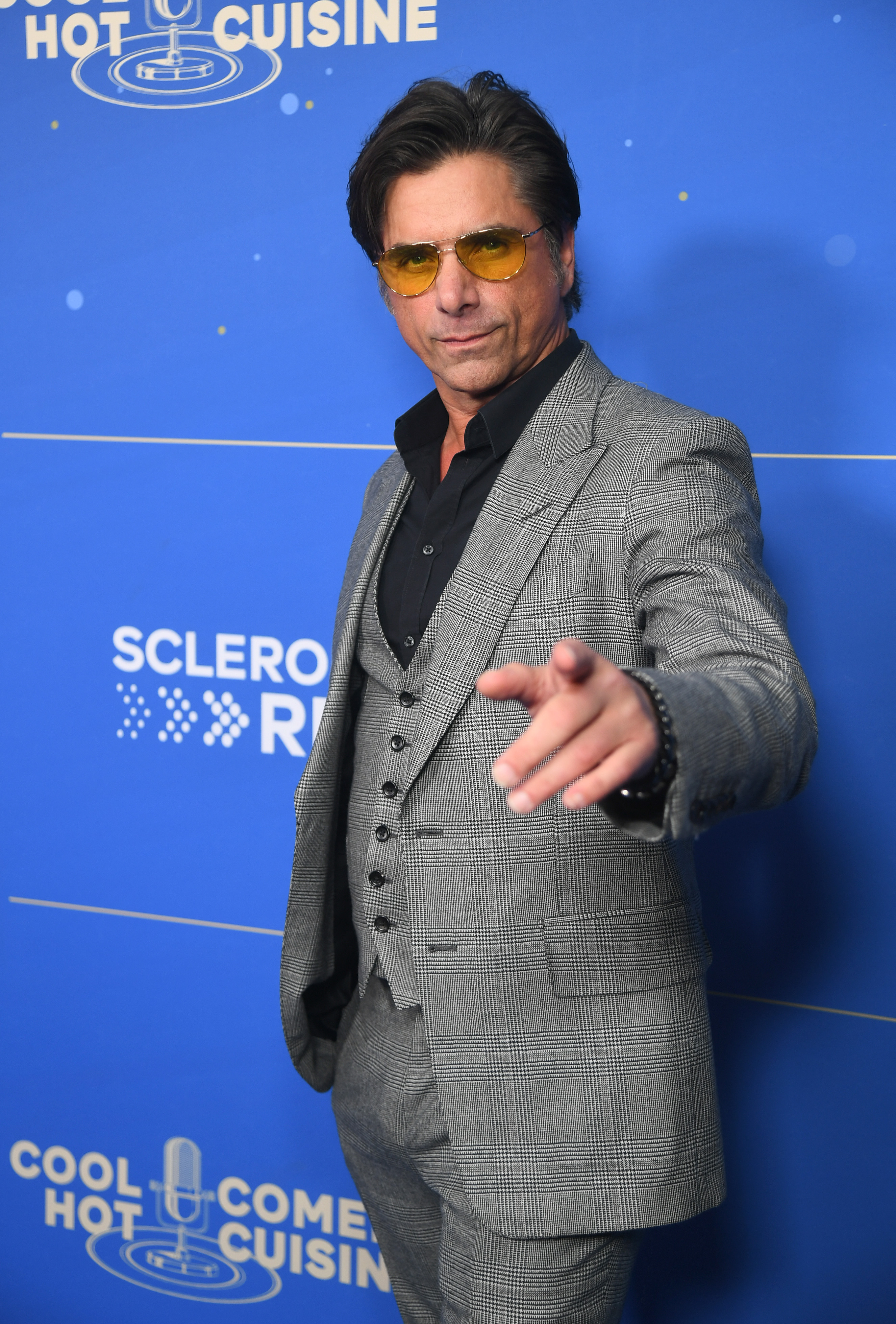 John Stamos has remained a familiar face in Hollywood while continuing to celebrate the legacy of "Full House" with his former castmates. Decades after first playing Uncle Jesse, he is still one of the show's most recognizable stars and often reflects on the lifelong friendships it gave him. | Source: Getty Images