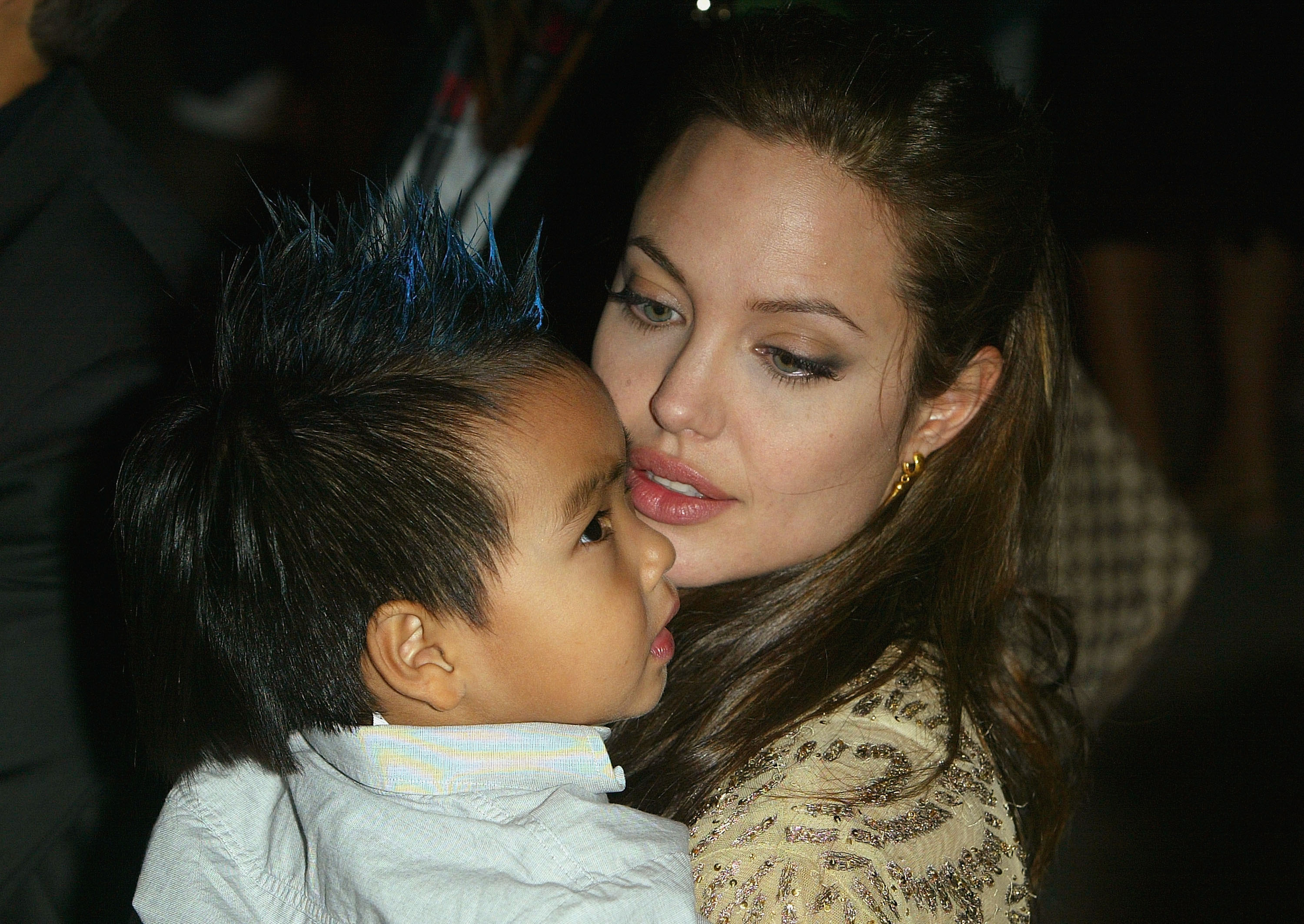 Angelina Jolie and her son Maddox attend the world premiere of "Shark Tale" on September 10, 2004 in Venice, Italy | Source: Getty Images