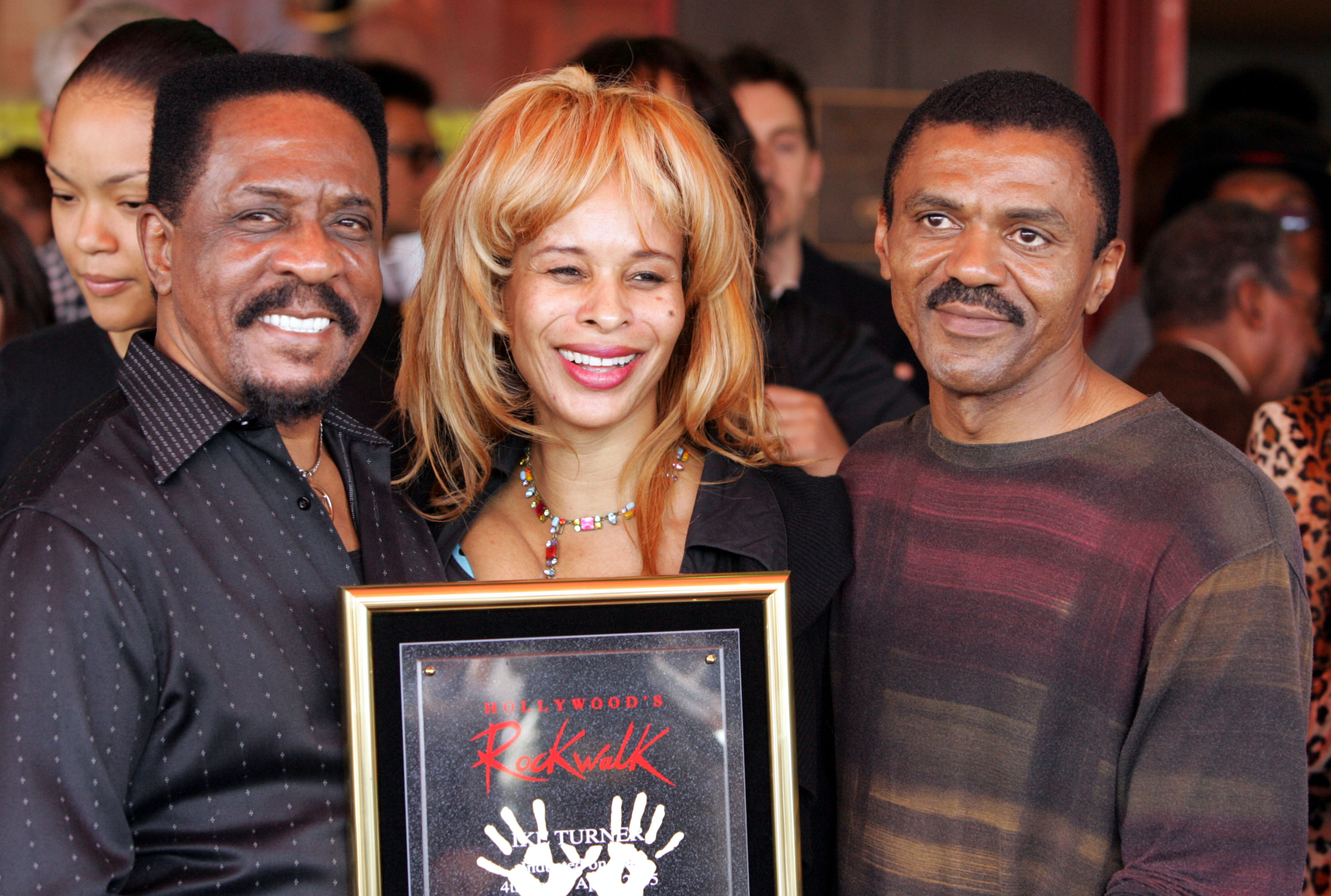Ike Turner Sr. poses with Audrey Madison and Ike Turner Jr. on April 4, 2005 | Source: Getty Images