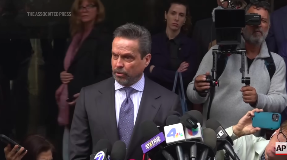 Alan Jackson addressing reporters. | Source: YouTube/Associated Press