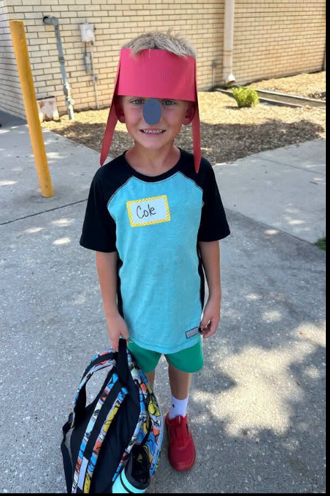 Six-year-old Adrian Cole is pictured wearing a playful costume during a childhood activity. Adrian, of McPherson, Kansas, was one of two people killed in the October 17 incident at Stryker Sports Complex in Wichita. | Source: Facebook/Riley Lue News