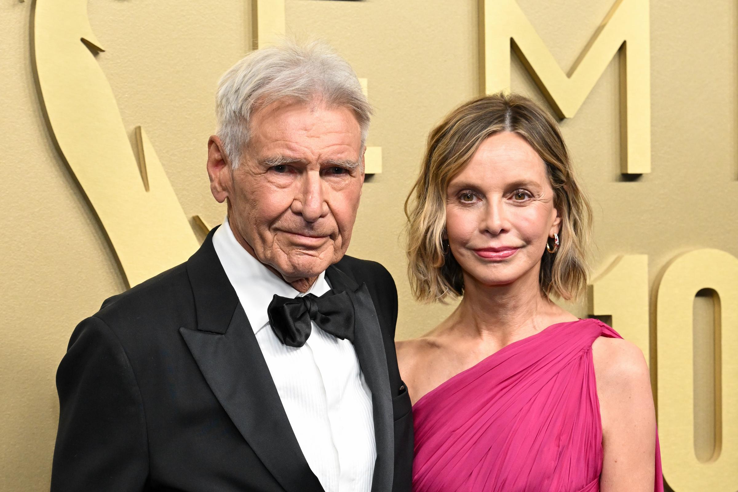 A closer photograph puts Flockhart's Emmys beauty look in focus alongside Ford. Her highlighted blonde hair was styled in a softly waved, chin-length bob, complemented by rosy cheeks and a pink lip.