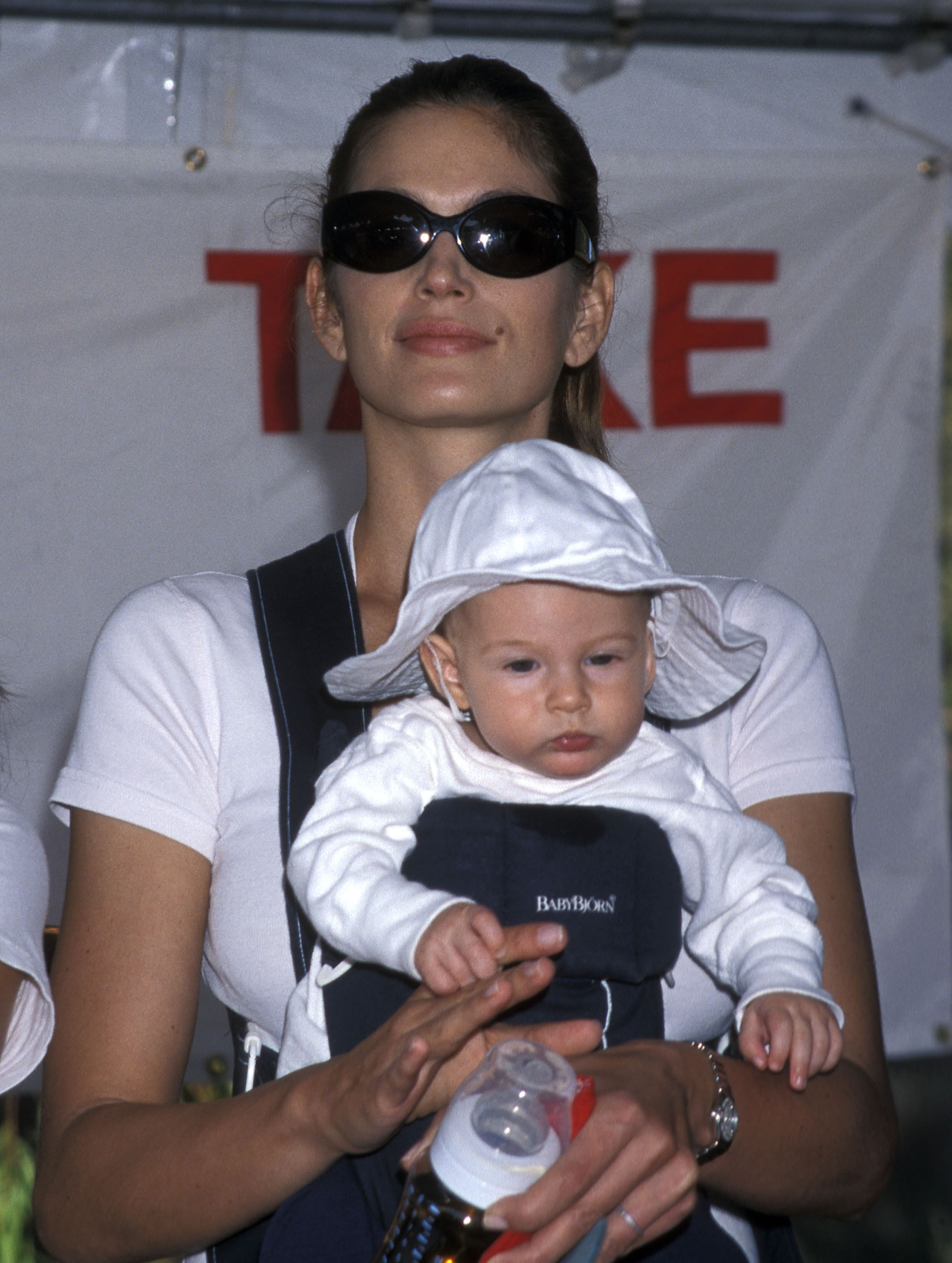 Cindy holds Presley Gerber at a breast cancer research benefit in Agoura Hills, California, on Oct. 9, 1999. Presley was just a few months old at the time. | Source: Getty Images