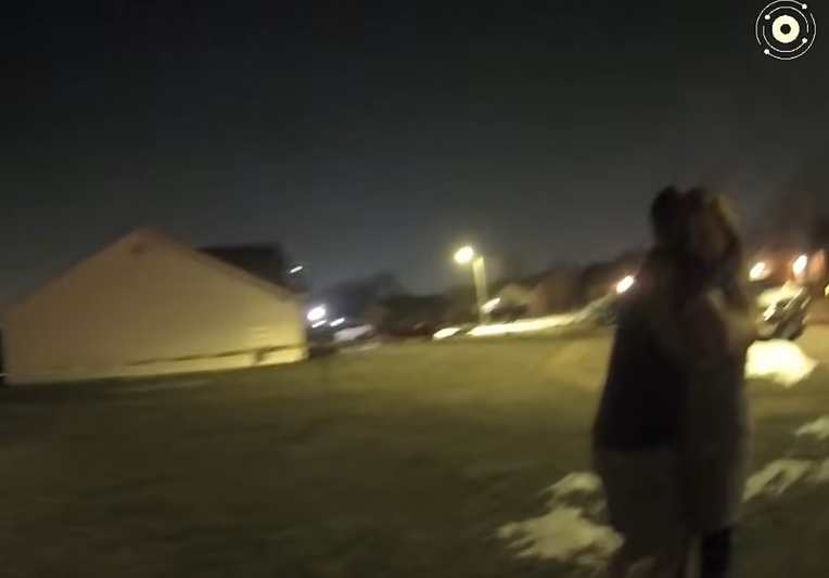 Bodycam footage showing Caleb Flynn hugging the grandmother of his children while both sobbed, dated March 2, 2026 | Source: YouTube/Law&Crime Network