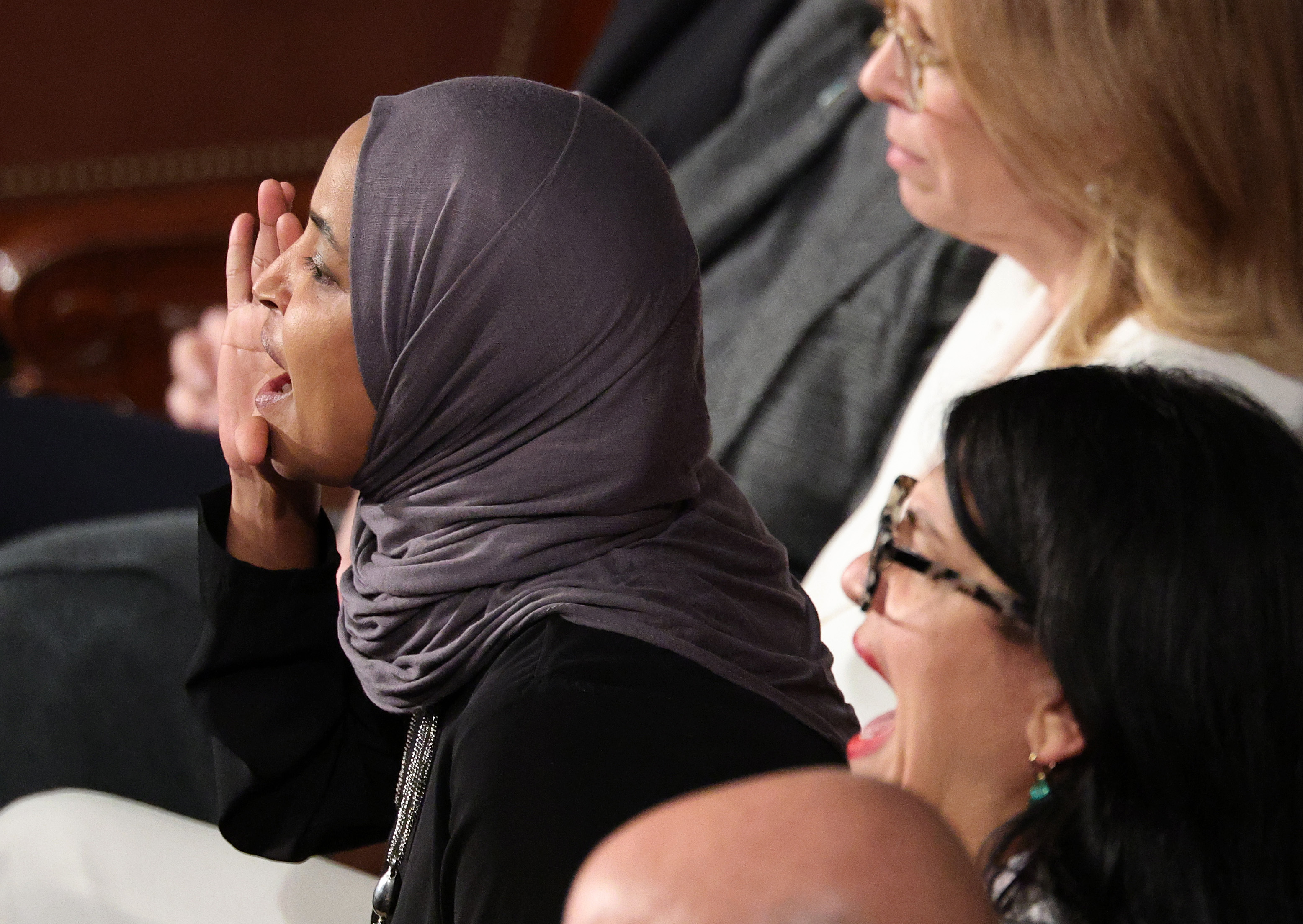 Rep. Ilhan Omar (D-MN) shouts during U.S. President Donald Trump's State of the Union address in Washington, DC on February 24, 2026. | Source: Getty Images